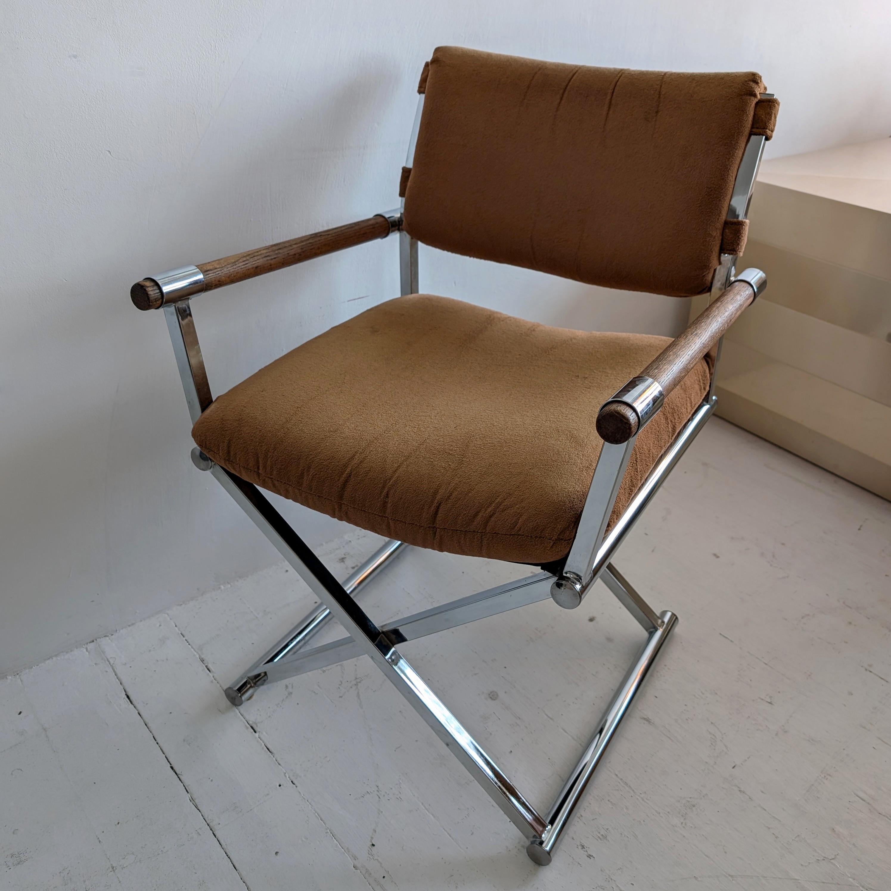 Stunning 1970s Milo Baughman-style X-frame director's chairs, in their original chocolate-brown velour upholstery. Chrome frames with oak armrests. Some age-related wear to fabric (one has some fading on the back rest), but overall in very nice