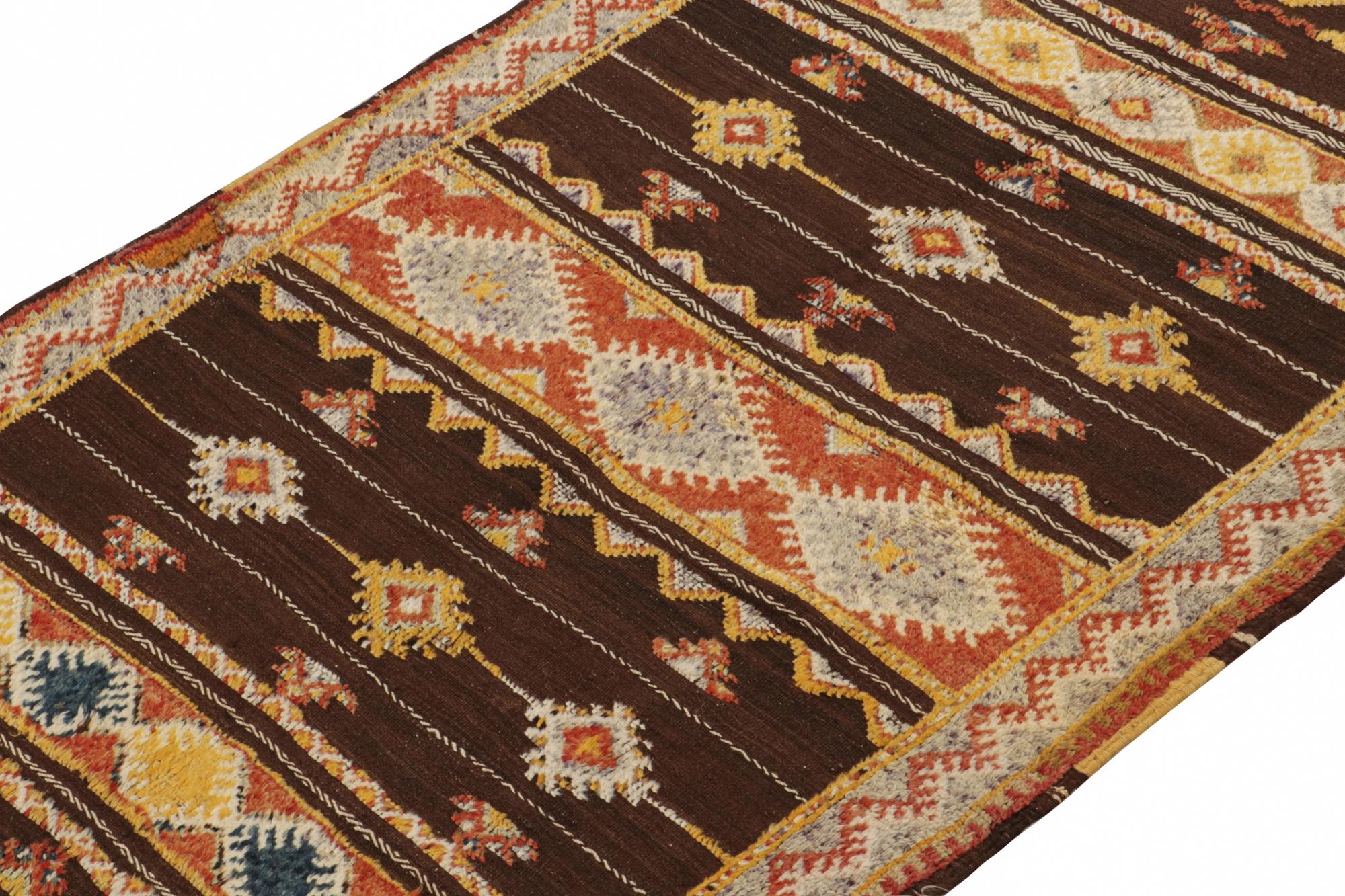Handwoven in wool circa 1950-1960, this 4x8 vintage Moroccan Kilim and Berber rug is an exciting new unveiling from the Rug & Kilim collection.

On the Design:

This flatweave is believed to originate from the Azilal tribe. This piece enjoys a rare