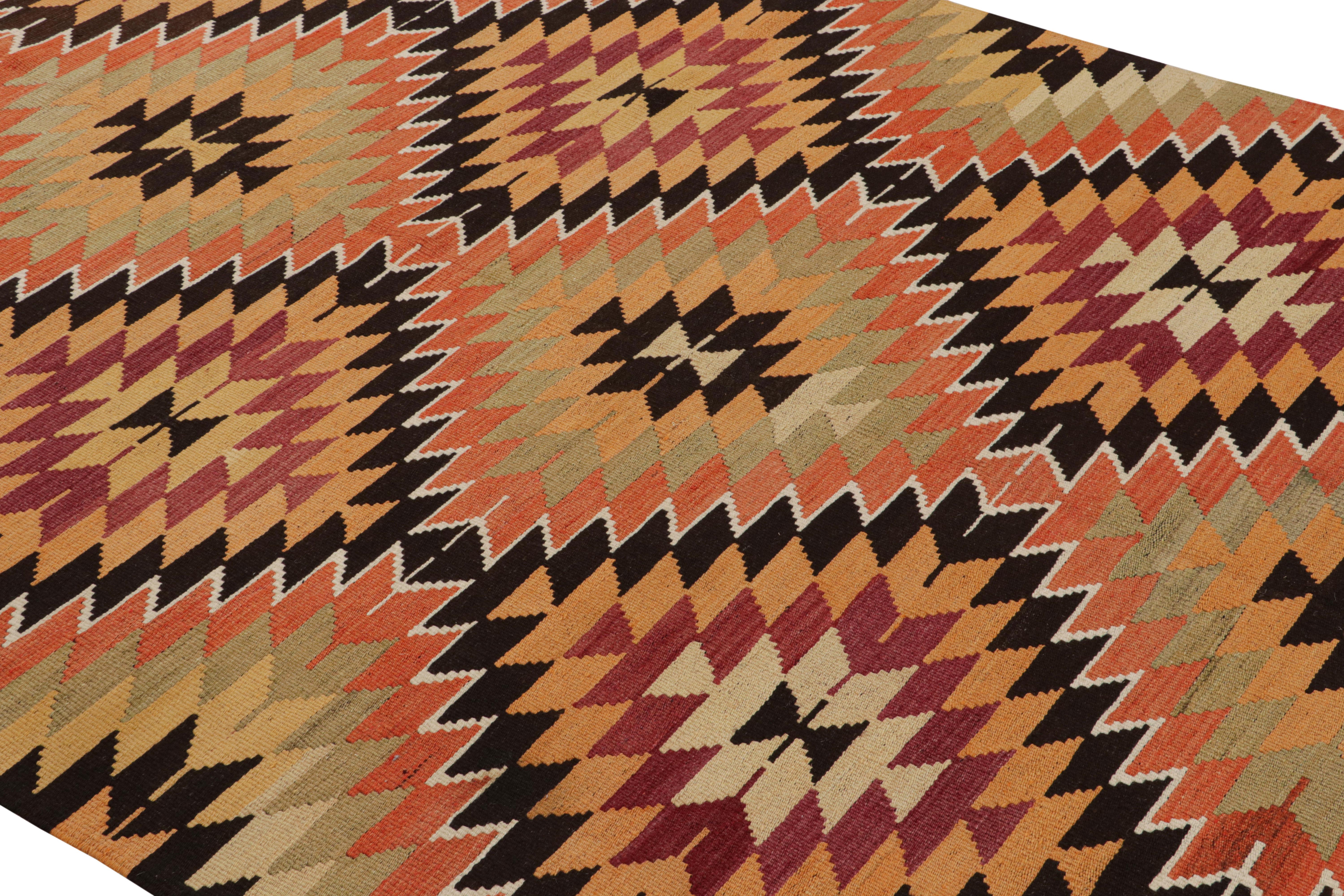 Handwoven in Turkey originating between 1950-1960, this vintage midcentury 6’ x 10’ wool Kilim hails from the town of Mut near the Mediterranean, a very diverse and nomadic locale for rarity in flat-weave rugs. This piece shows a unique and skilful