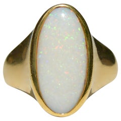 Vintage Midcentury Opal 8.5 Carat 14 Karat Gold Oval Signet Ring