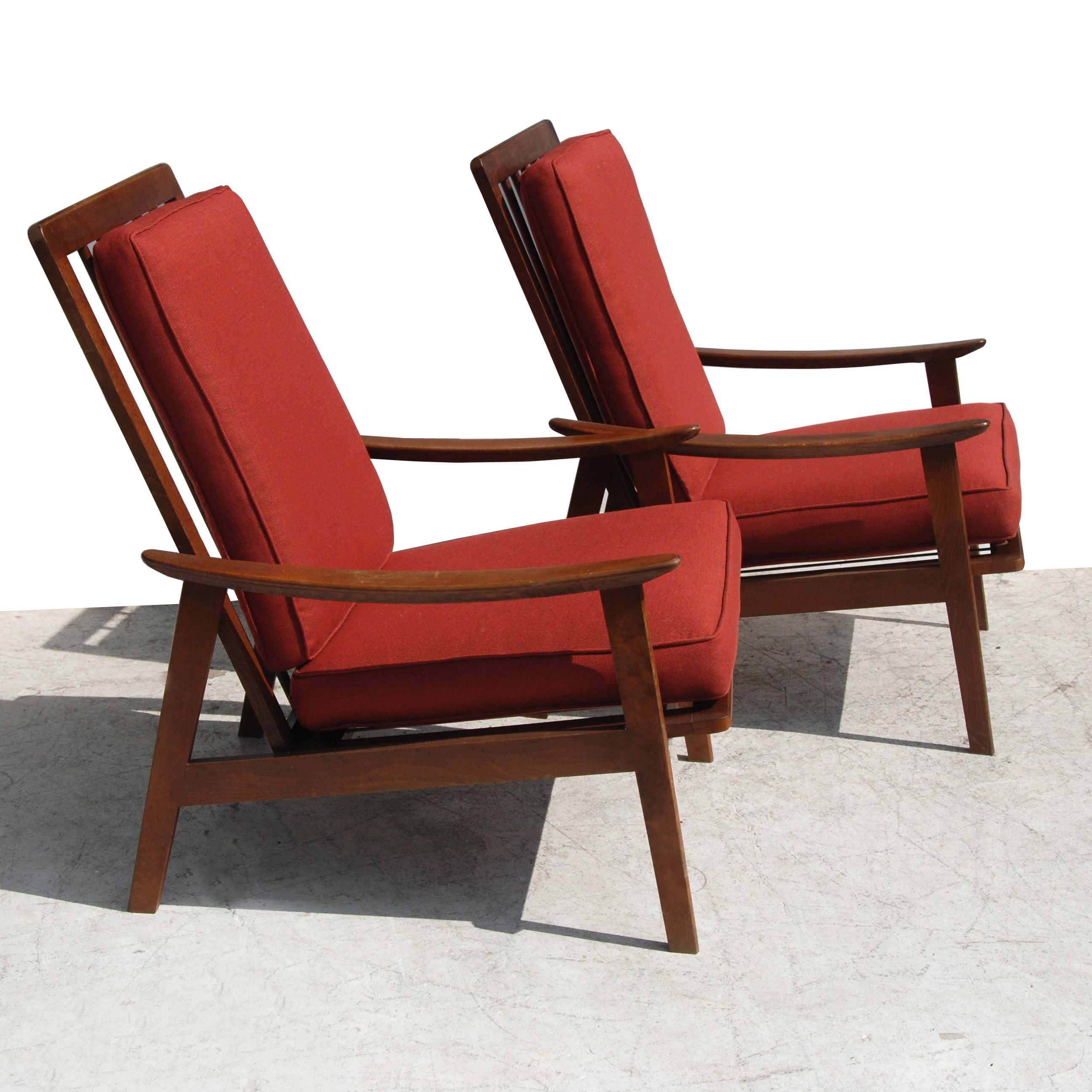 Vintage midcentury pair of Danish lounge chairs

Walnut frame.
Recently reupholstered in a warm red textile.

  