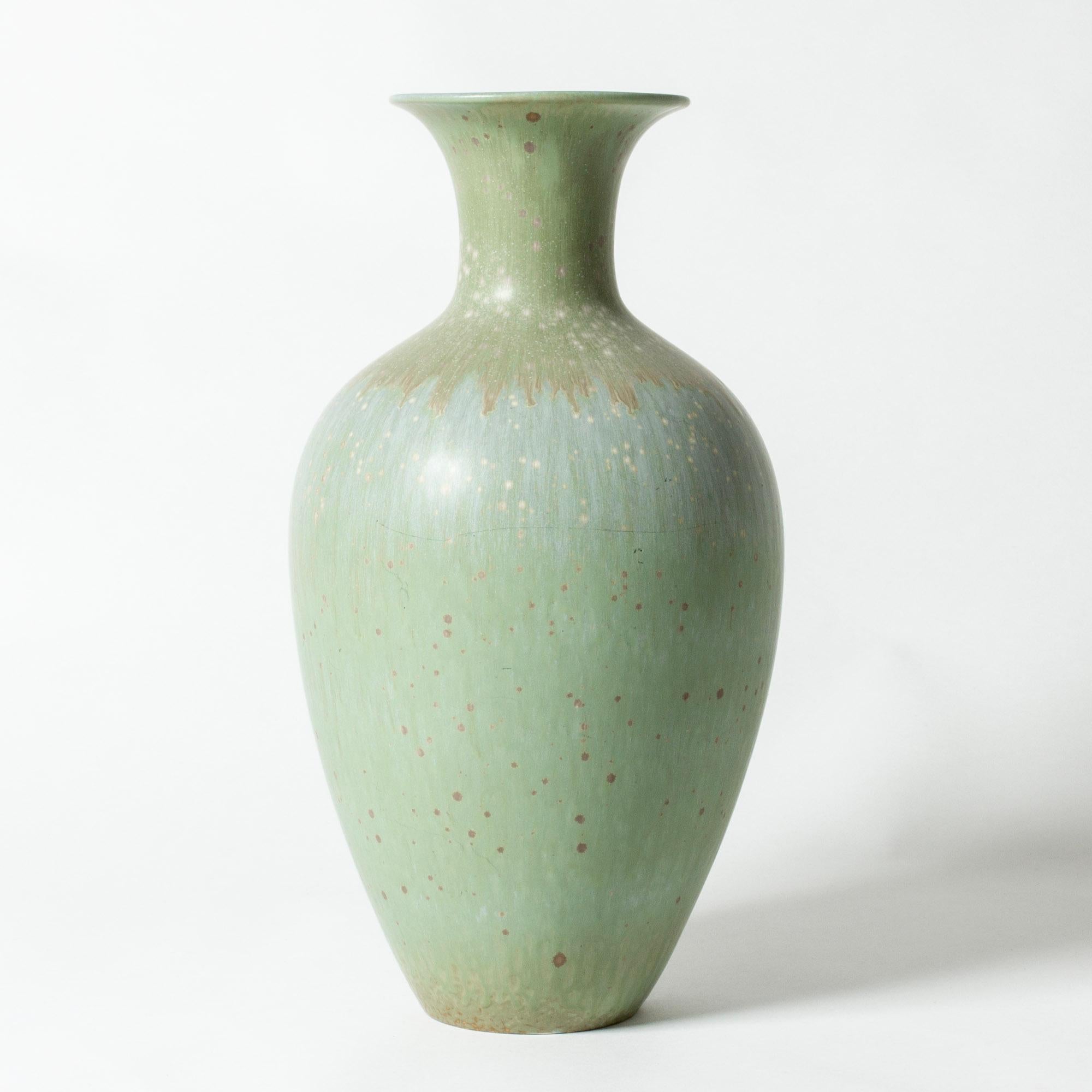 Large stoneware floor vase by Gunnar Nylund in a classic shape. Beautiful glaze in a pale celadon nuance.