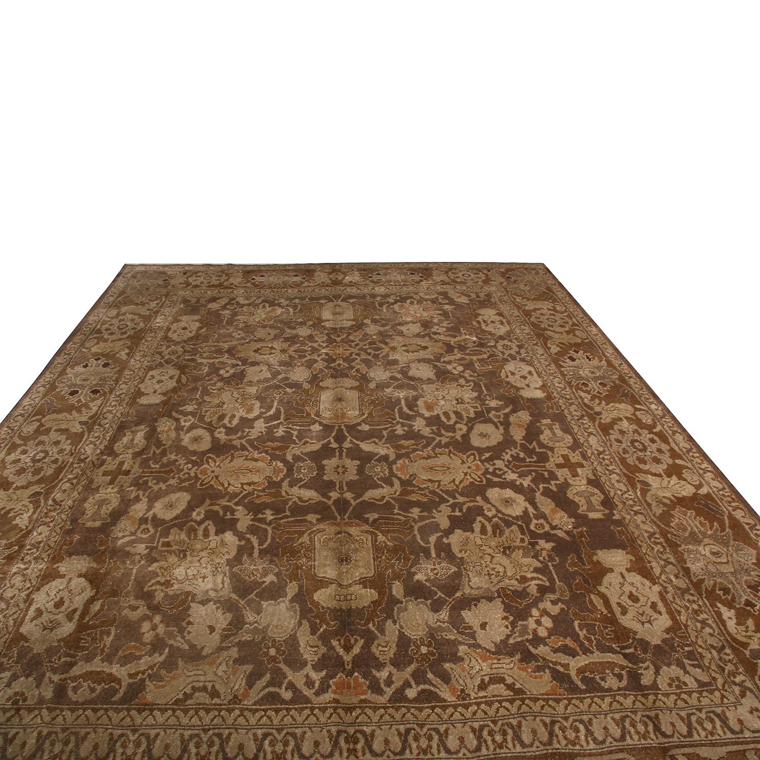 Hand knotted in Persia originating between 1950-1960, this vintage Sultanabad wool rug enjoys pristine condition with a Classic pallet of rich and warm beige-brown colorways, complementing the muted, elegant all-over floral pattern while accented