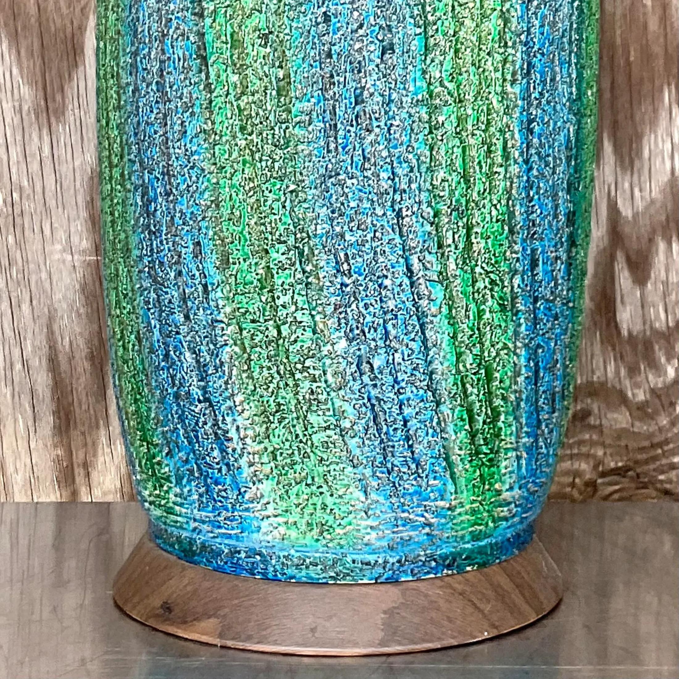 A fantastic vintage MCM table lamp. A brilliant lava textured finish in a stripe design. Acquired from a Palm Beach estate.