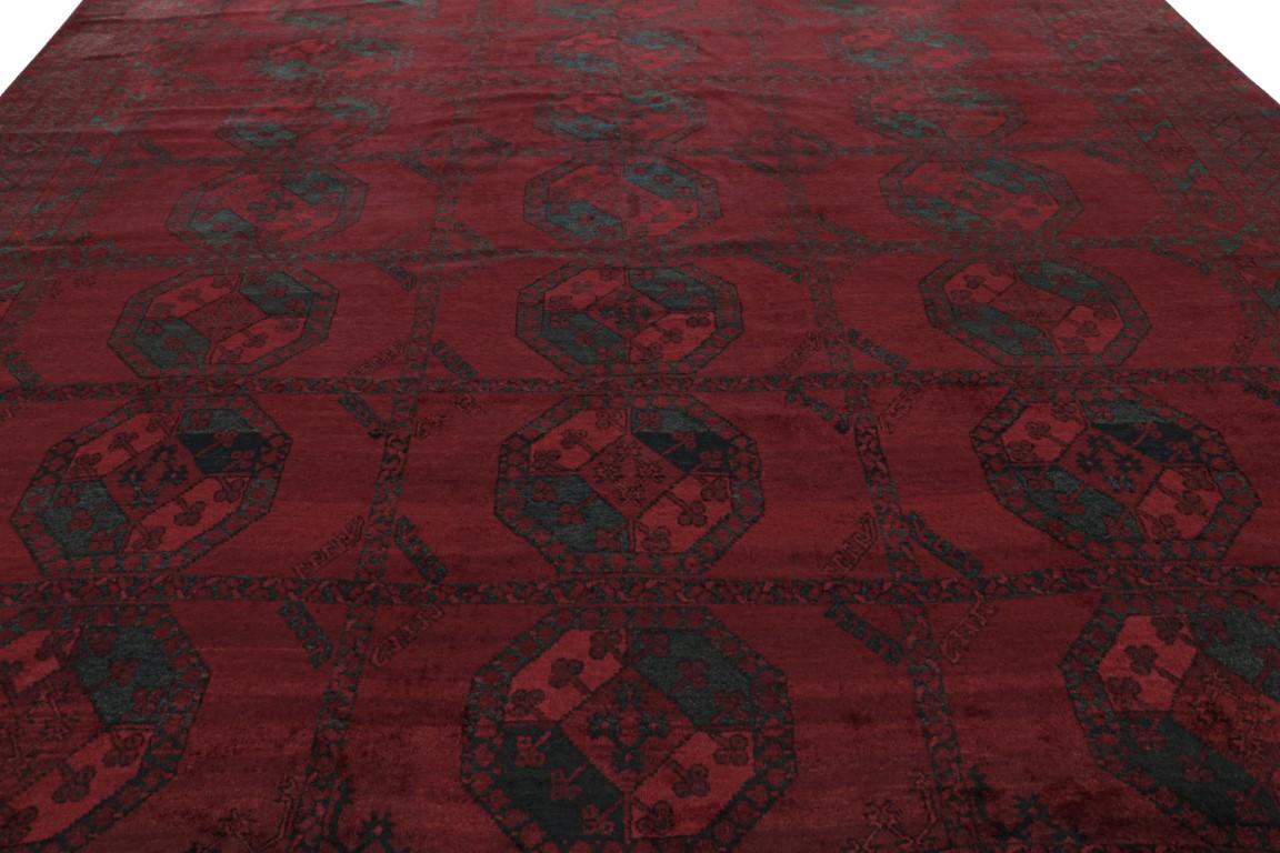 Originating from Afghanistan in 1950, hand knotted in durable, high-quality wool, this more modern Afghan piece enjoys a more finely woven pattern than even its renowned antique ancestors, though it still employs bold color contrast with the