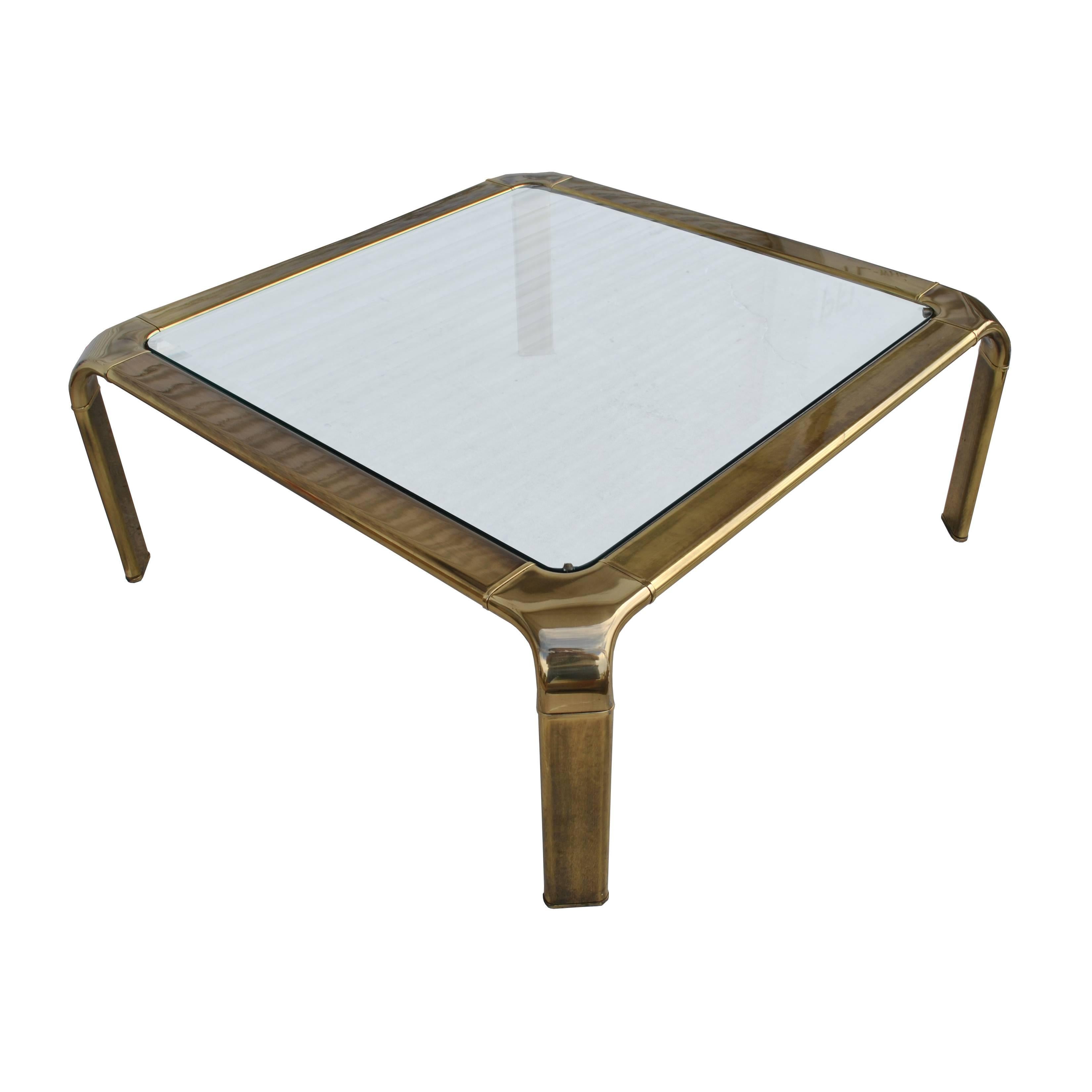 Widdicomb 

Vintage midcentury waterfall brass coffee table by Widdicomb 

1970s 


A waterfall style brass plated frame with a thick beveled glass insert.