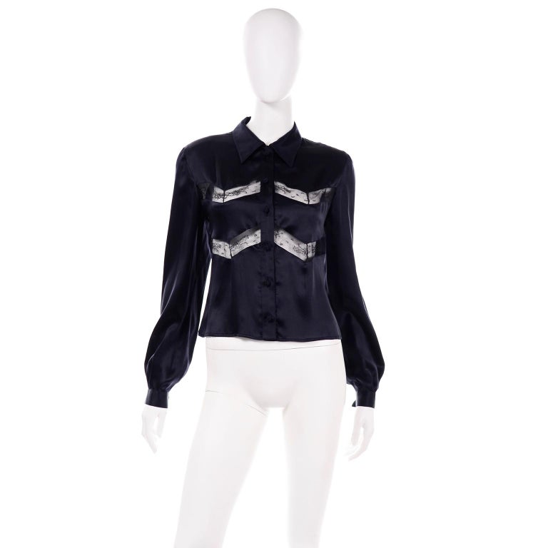 This Valentino vintage midnight blue silk blouse has beautiful inset fine lace and knotted fabric buttons. The silk is so luxurious and the top is in excellent condition. This top has the Miss V Valentino label and is from an estate we acquired that