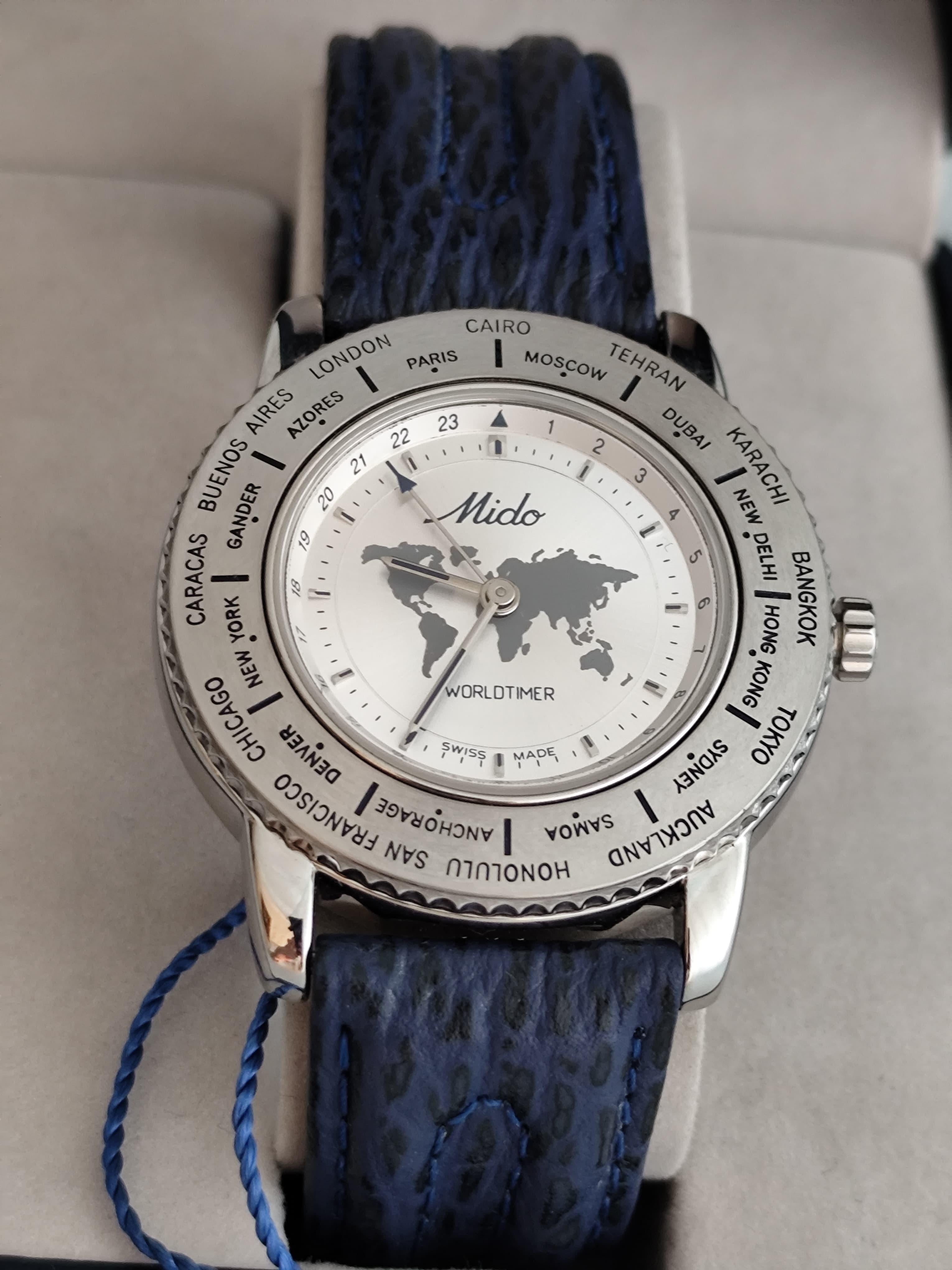 Brand: Mido

Model: Worldtimer

Reference Number: 5200

What's Included : Tag - Outer Box -Inner Box - Manuals

Country Of Manufacture: Switzerland

Movement: Quartz

Case Material: Stainless steel

Measurements : Case width: 38 mm. (without