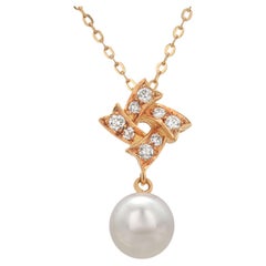 Collar colgante vintage Mikimoto de oro amarillo de 18 quilates con perlas y diamantes
