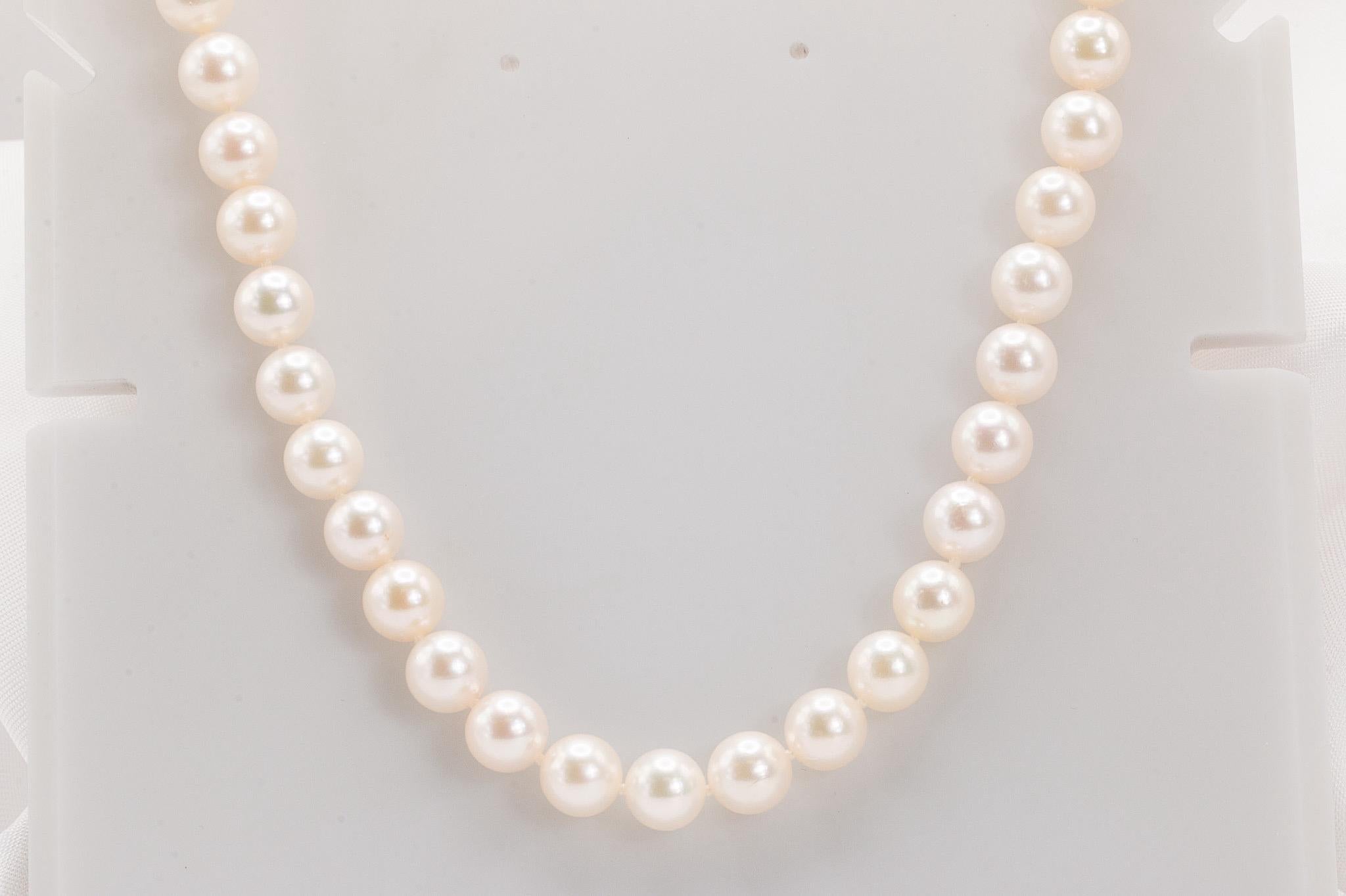 This exquisite Mikimoto 18K yellow gold pearl necklace from the 1990s showcases a timeless and elegant design, featuring 108 lustrous pearls. Measuring 31 inches in length and 7mm in width, this beautifully crafted piece exudes sophistication.