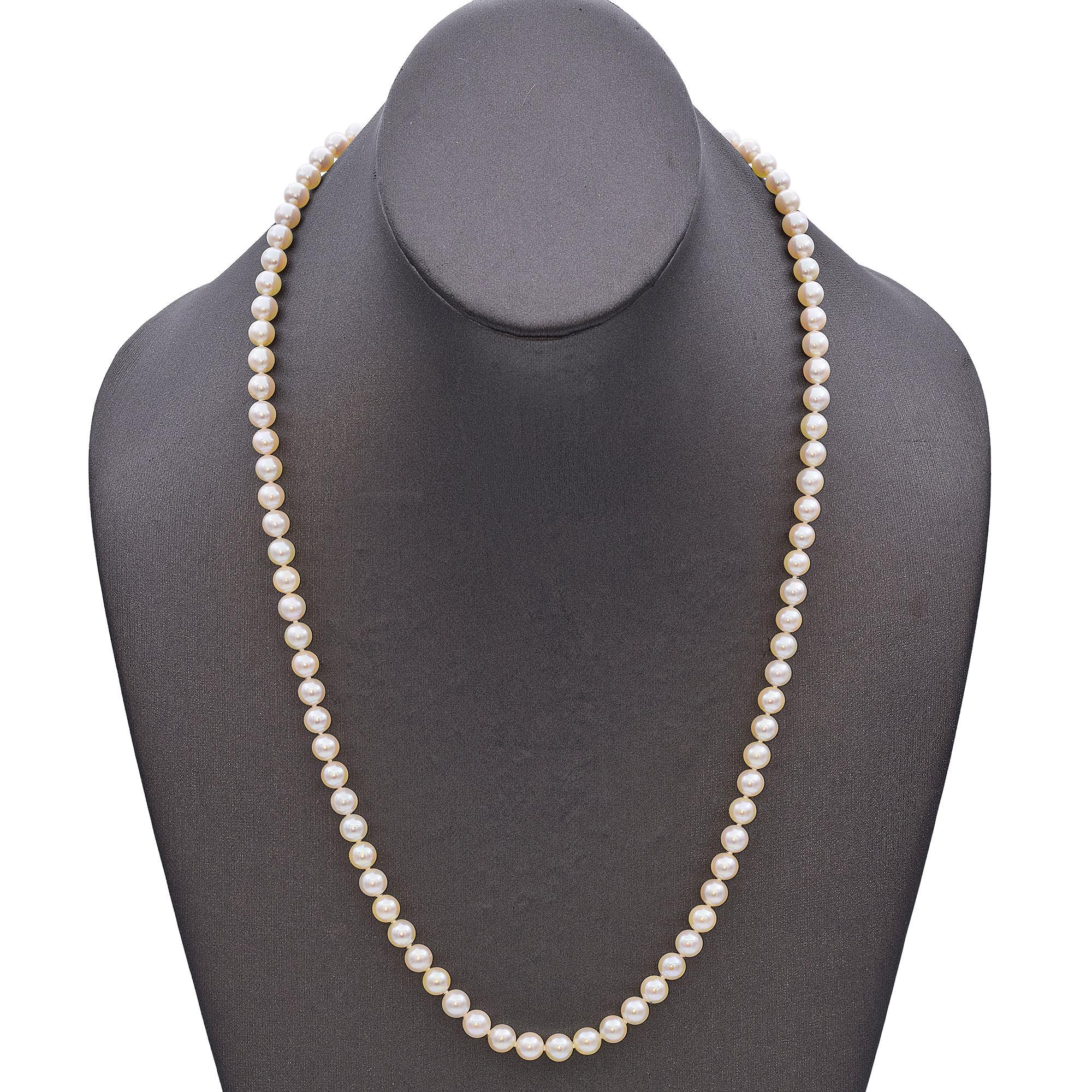 Crafted by Mikimoto, this elegant pearl necklace features lustrous, perfectly matched pearls, expertly strung and secured with a 14k yellow gold ribbed clasp. The 