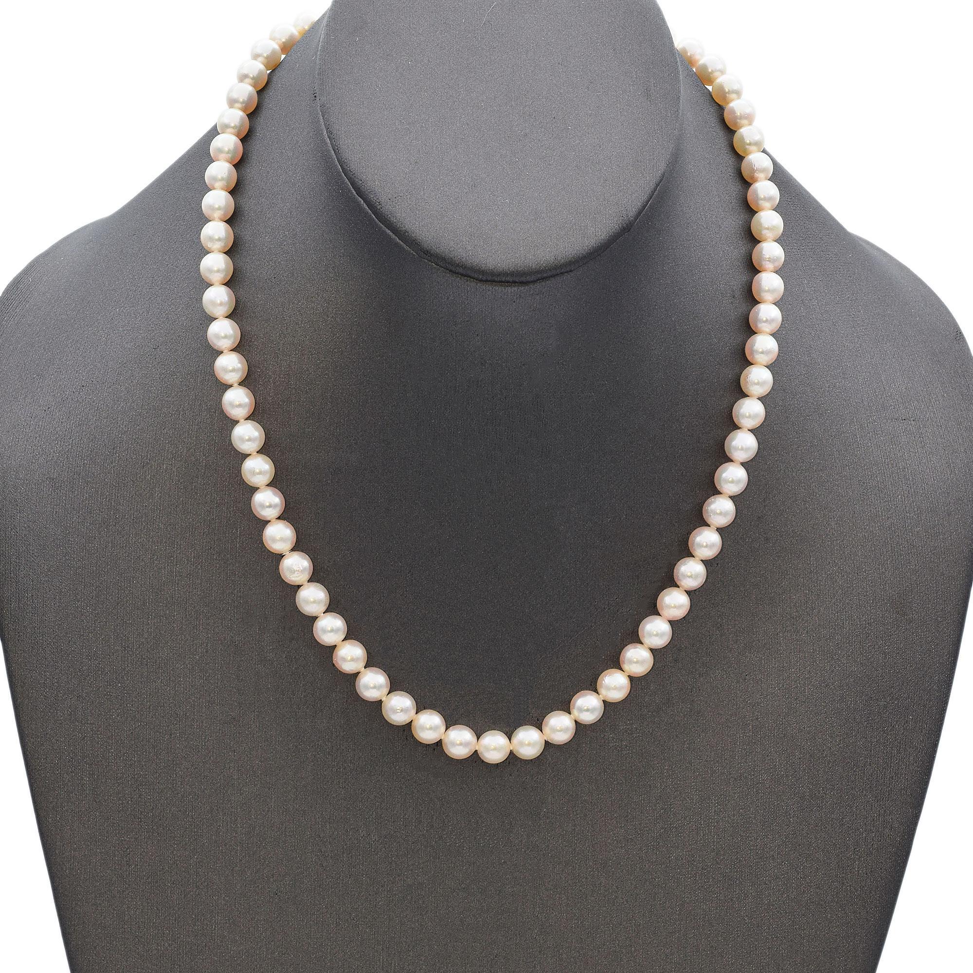 Crafted by Mikimoto, this elegant pearl necklace features lustrous, perfectly matched pearls, expertly strung and secured with a 14k yellow gold ribbed clasp. The 