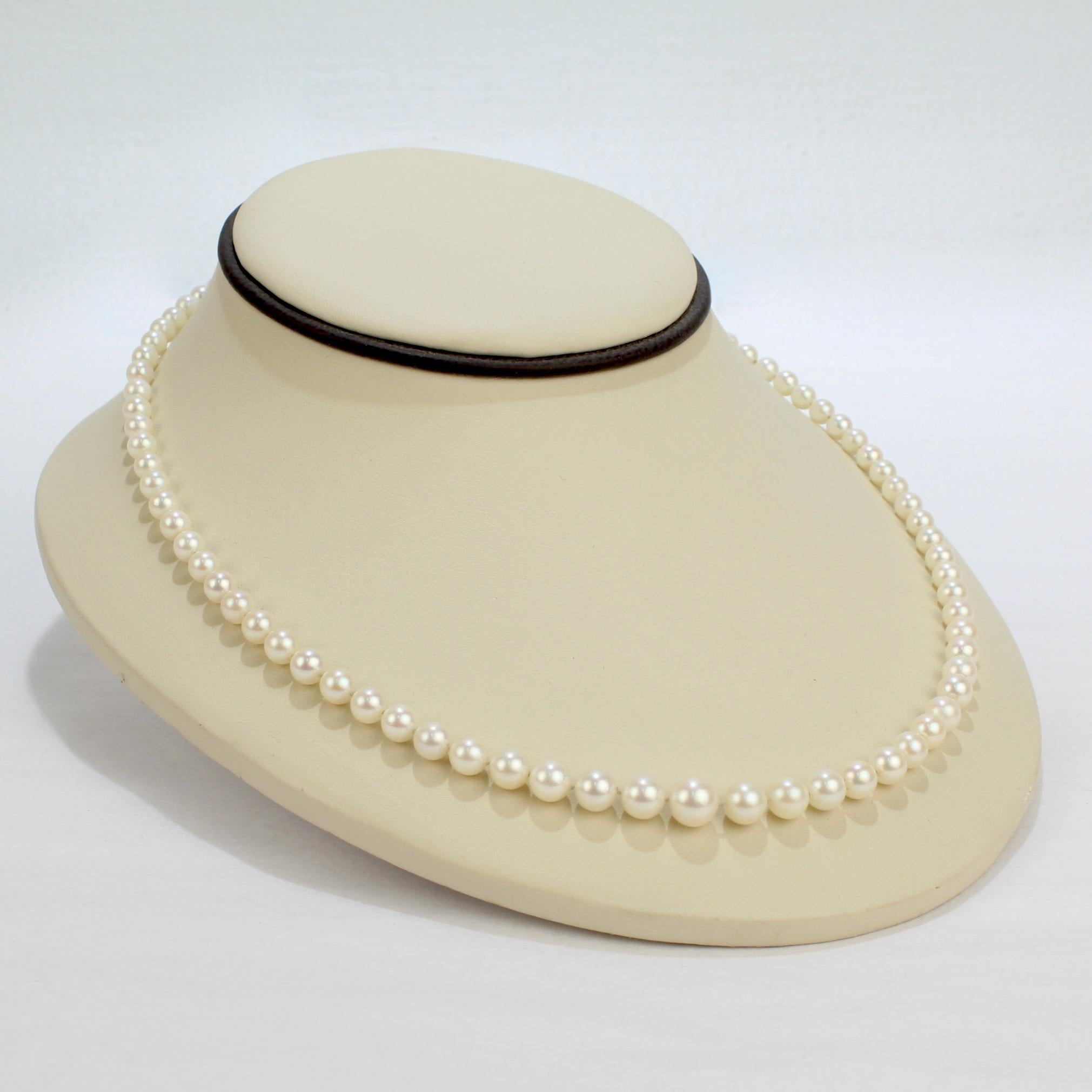 A very fine vintage Mikimoto Akoya cultured pearl strand necklace with a sterling silver clasp.

With graduated round white pearls on hand knotted silk.

Simply a fine necklace from Mikimoto!

Date:
20th Century

Overall Condition:
It is in overall