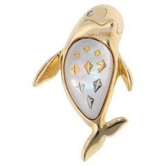 Spilla vintage Mikimoto a forma di conchiglia e delfino con diamanti in oro giallo