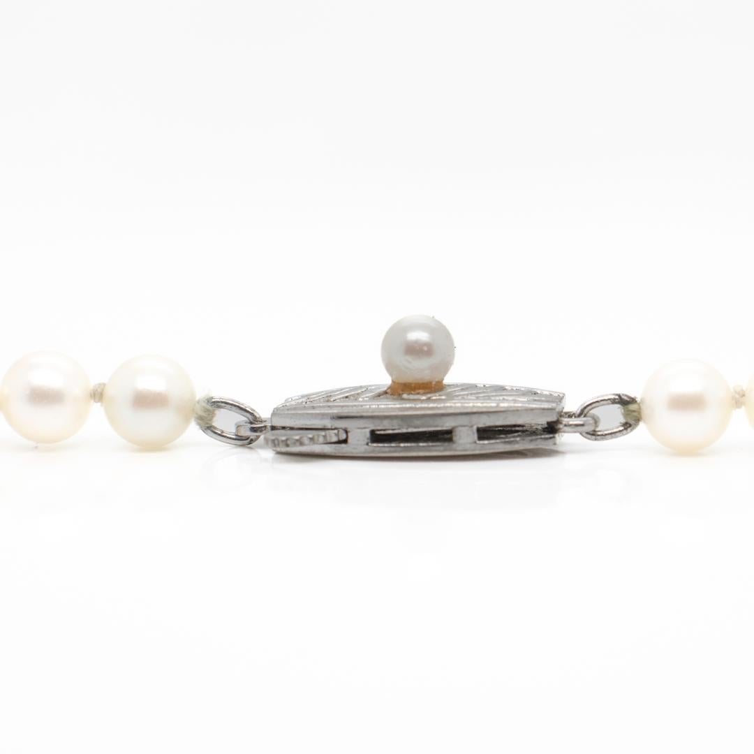 Vintage Mikimoto Single Strand of Small 5mm White Akoya Pearls In Good Condition For Sale In Philadelphia, PA