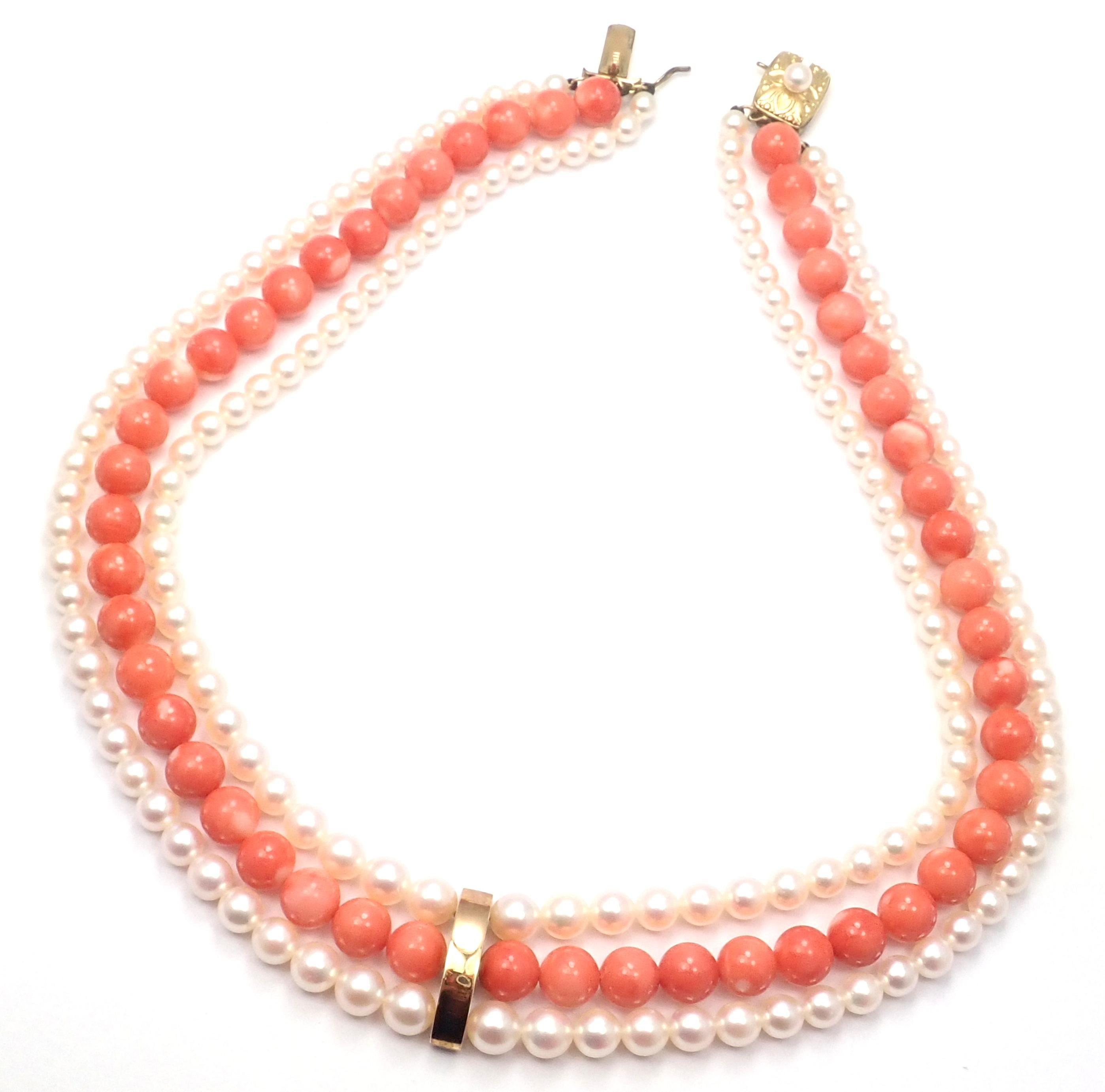 14k Yellow Gold Triple Stand Coral Pearl Bead Vintage Necklace by Mikimoto.
With 2 stands of pearls from 6mm to 4mm
1 strand of coral beads 7.5mm each
Details:
Measurements: 
Necklace Length: 15