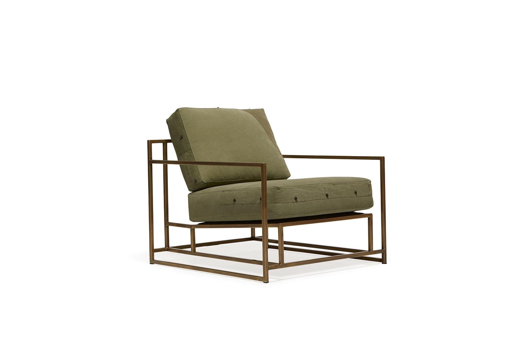 The Inheritance Armchair by Stephen Kenn is as comfortable as it is unique. The design features an exposed construction composed of three elements - a steel frame, plush upholstery, and supportive belts. The deep seating area is perfect for a