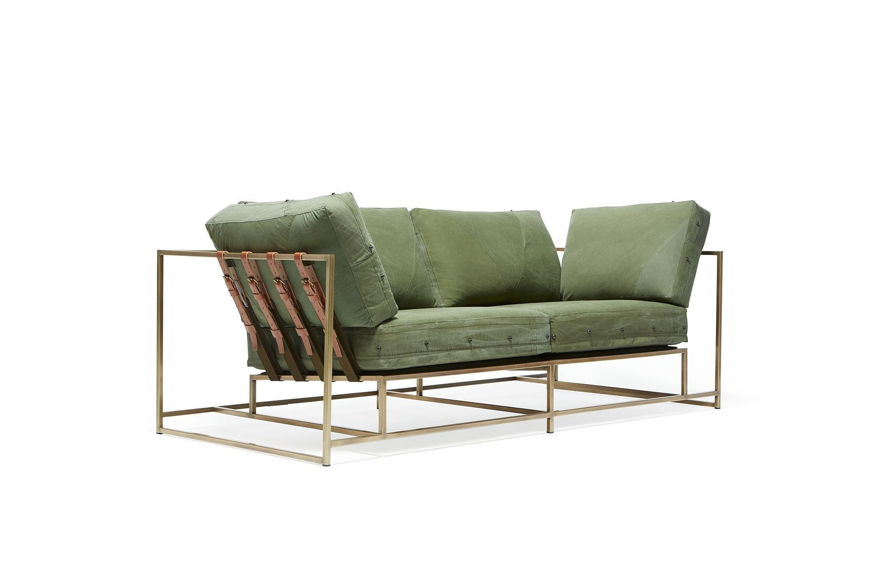 The Inheritance Two Seat Sofa by Stephen Kenn is as comfortable as it is unique. The design features an exposed construction composed of three elements - a steel frame, plush upholstery, and supportive belts. The deep seating area is perfect for a