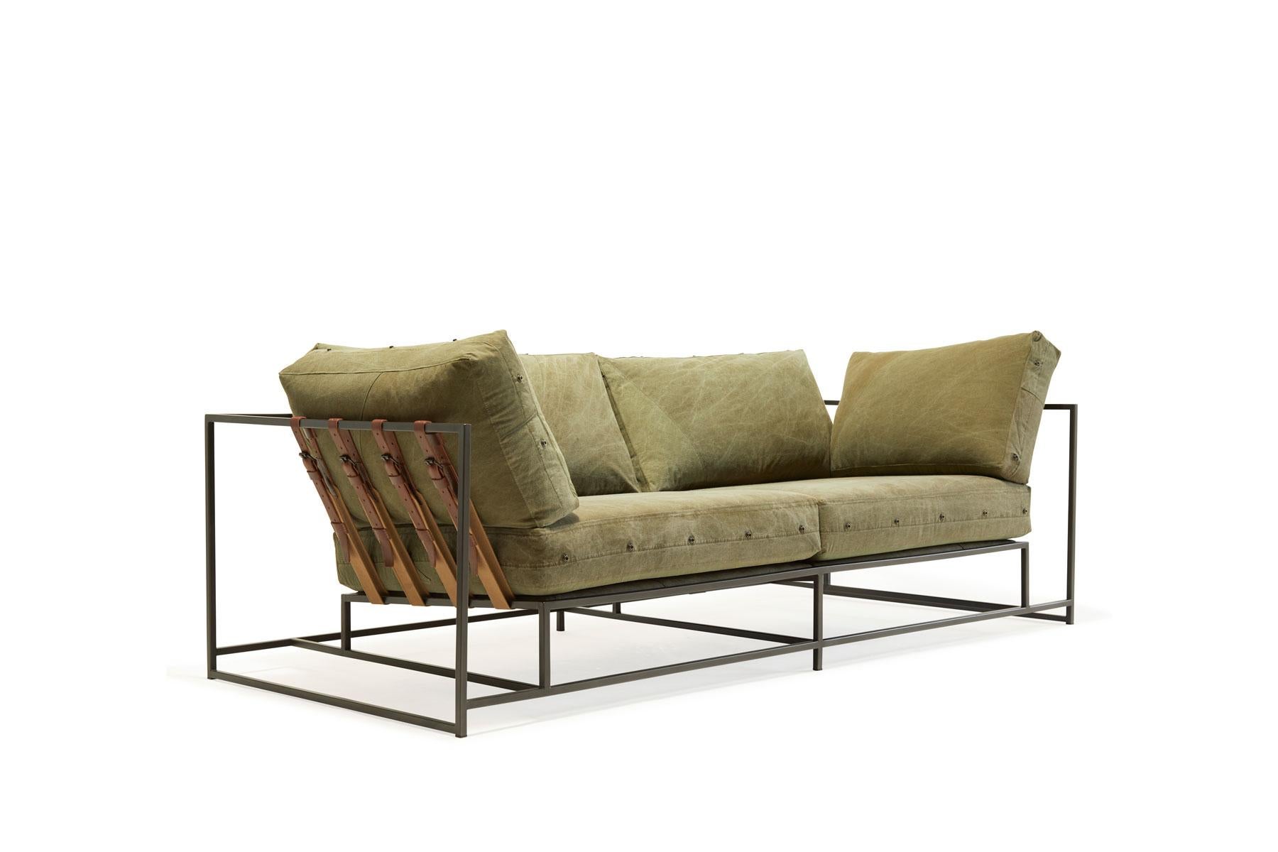 Slightly smaller in size, the two-seat sofa is ideal for apartments or smaller spaces requiring a smaller footprint.

Since first designing Inheritance collection, Stephen Kenn has been inspired by the inherent history in vintage military-issue