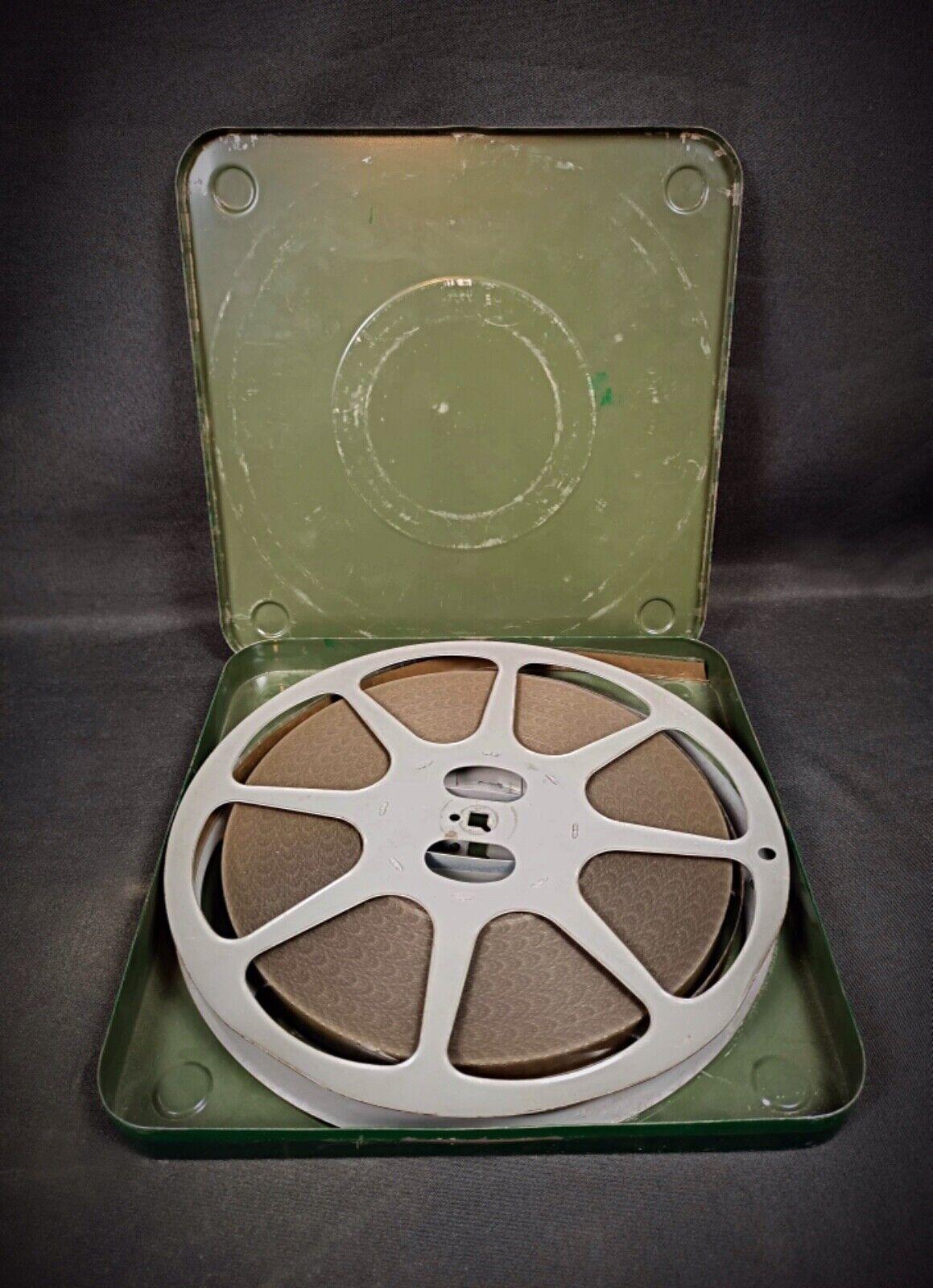 This rare and historic militaria collectible features a vintage military film in its original metal box from the Établissement Cinématographique et Photographique des Armées (ECPA). The film, titled Tireur d'élite, provides a unique glimpse into
