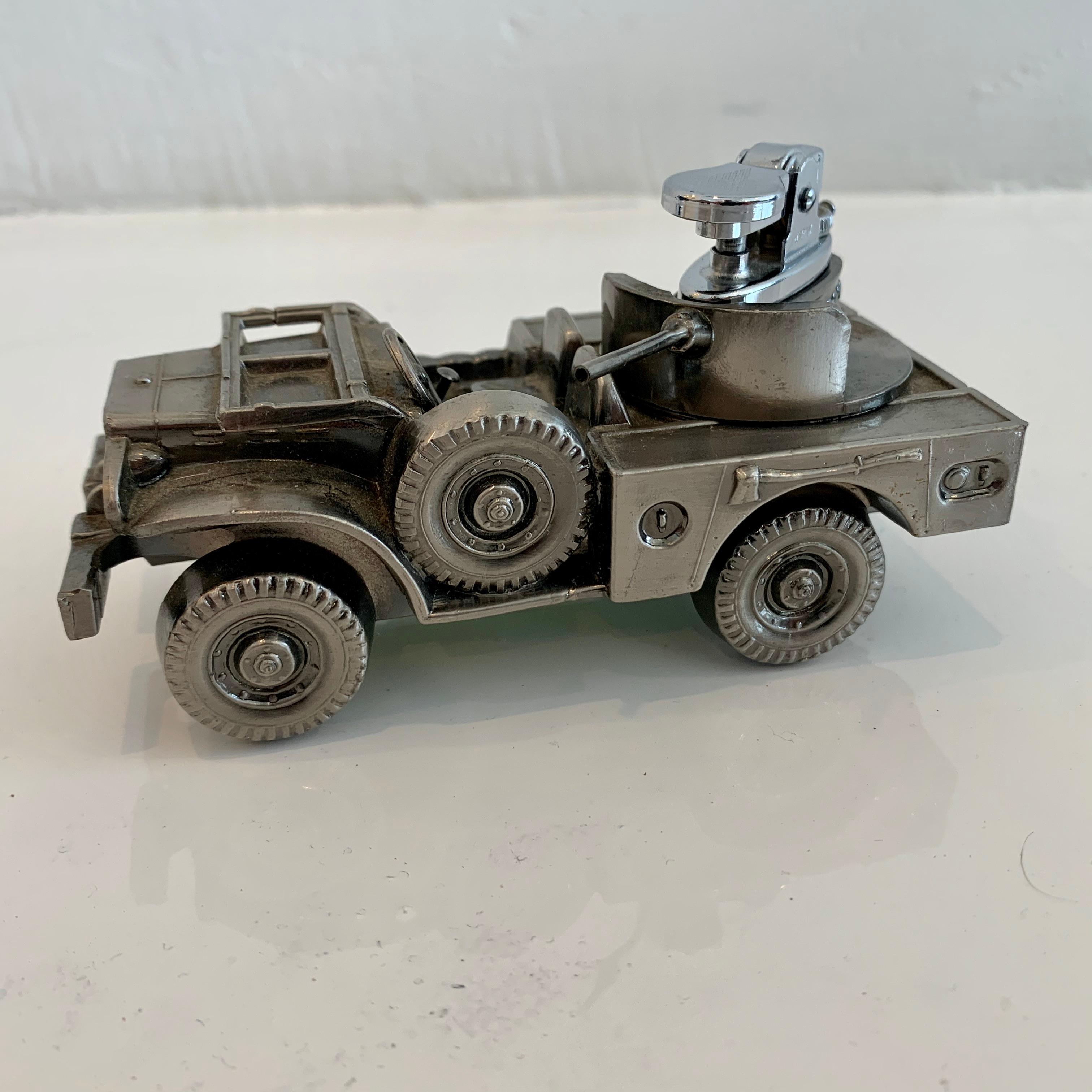 Cool vintage table lighter in the shape of a military tank. Rotating gun turret with a lighter inside. Great vintage condition. Cool tabletop object.
  