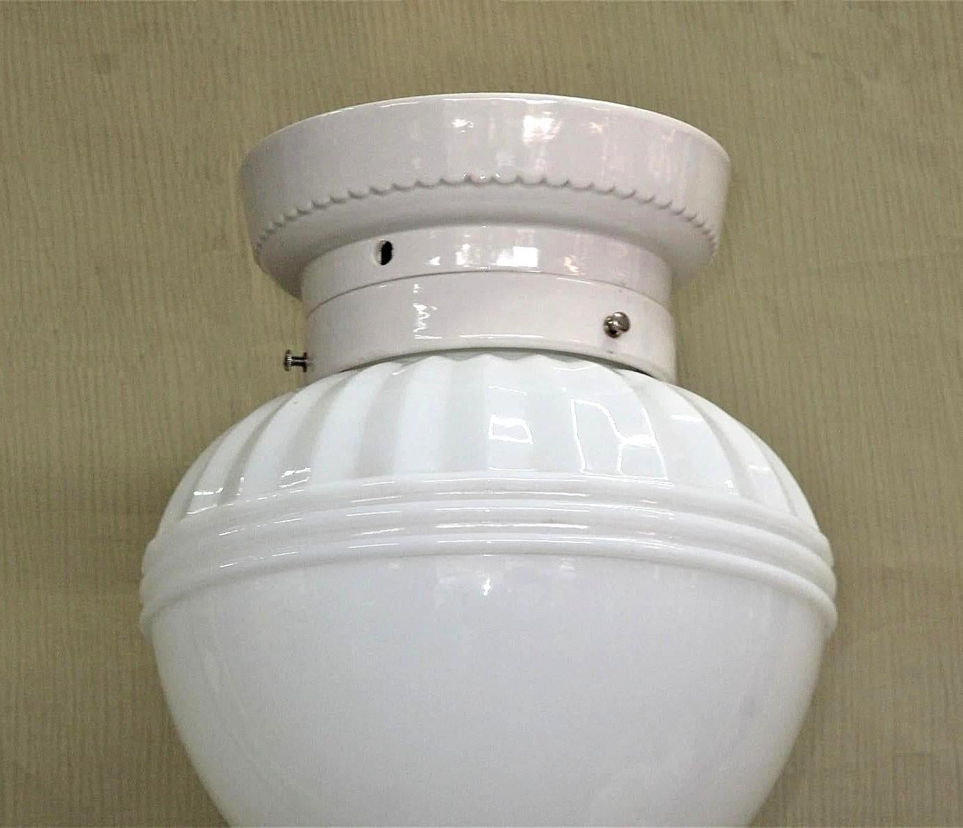 The globe has a nice, interesting pattern including concentric rings at the bottom, a nod towards the coming mid-century style.
Popular from the late teens through the mid-30s, Milk Glass shades or globes were the staple lighting fixtures in