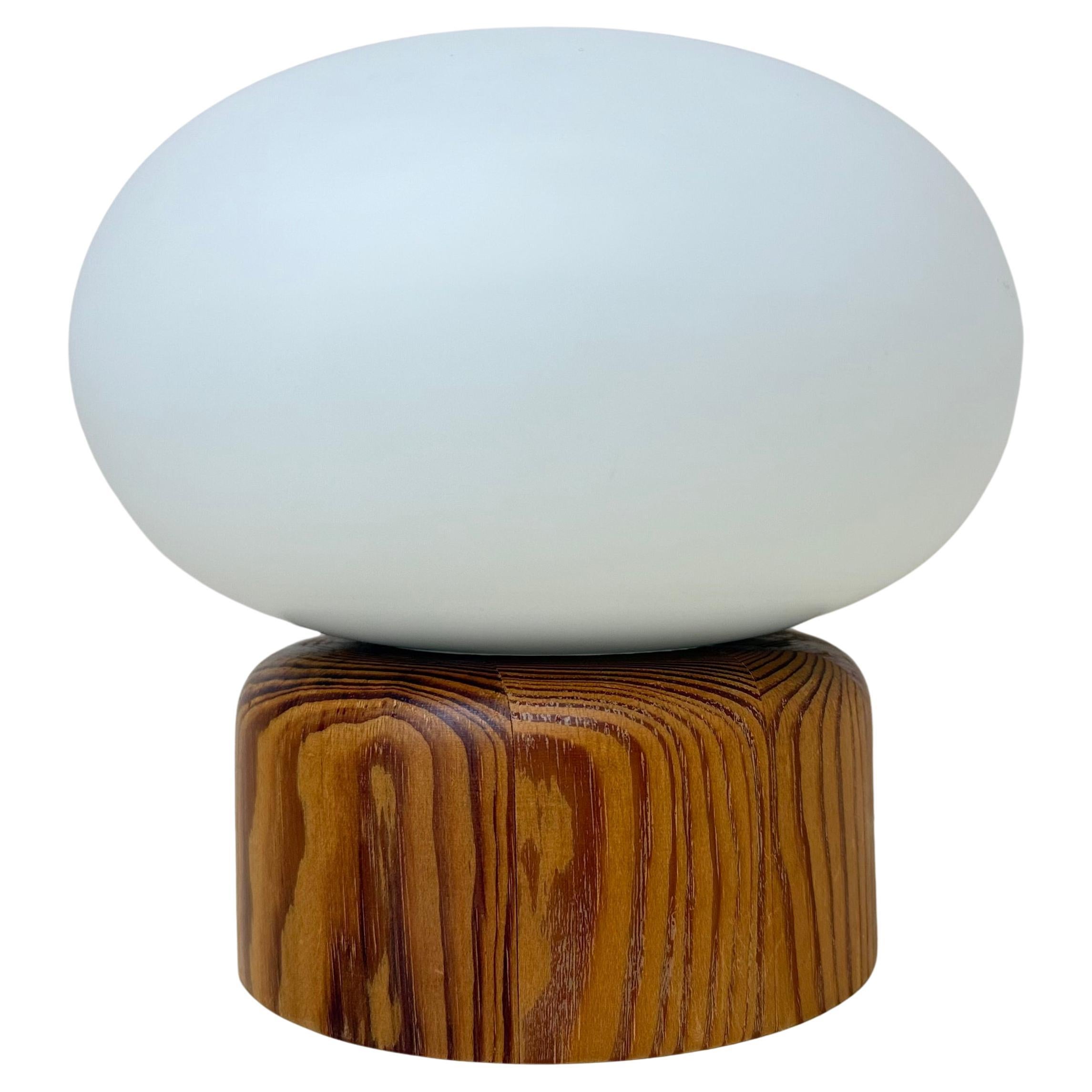 Vintage milk glass table lamp with wooden base by Bestform Freudenberg , 1970s For Sale