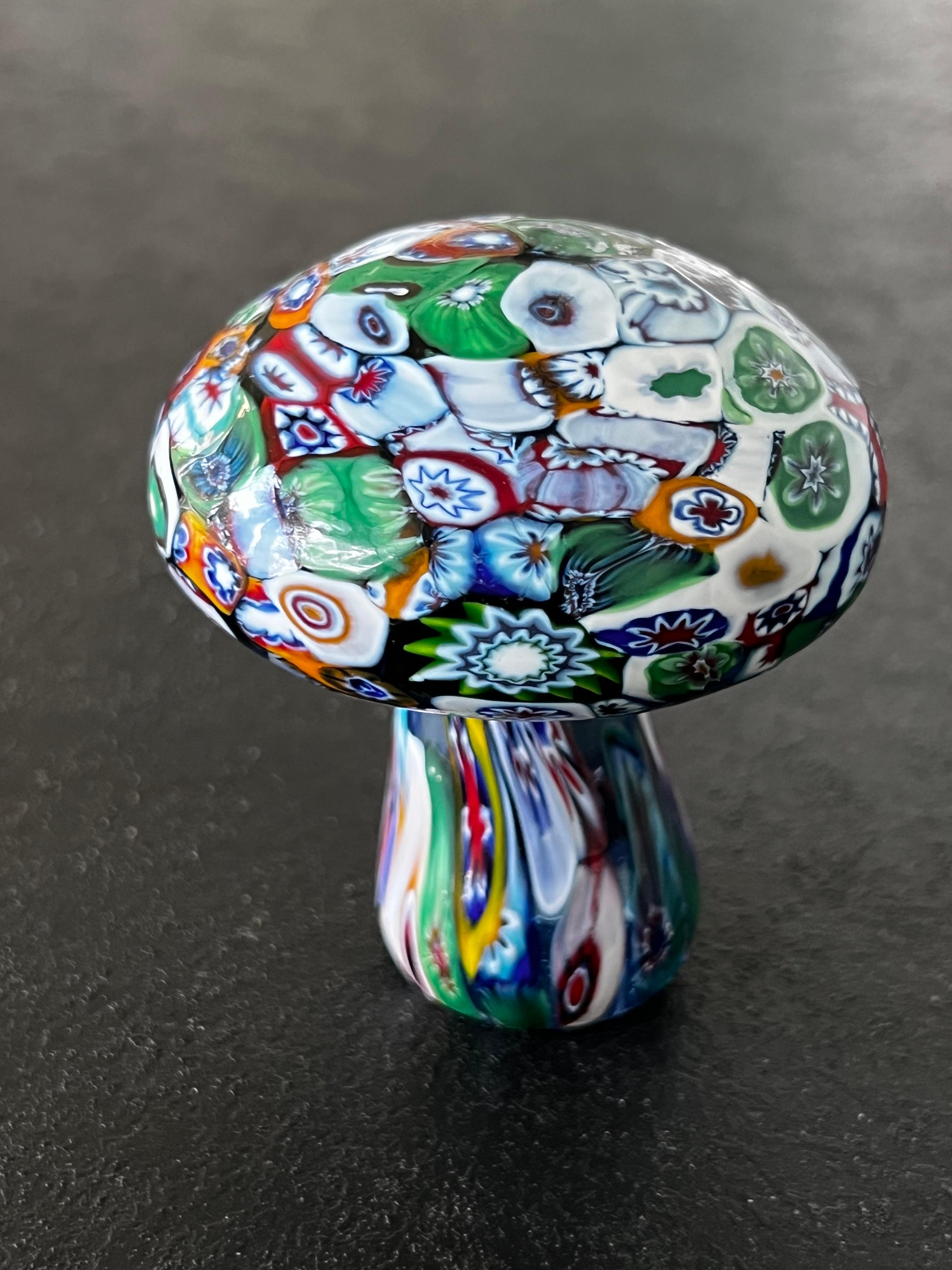Beautiful vintage glass millefiori paperweight shaped like a mushroom. would perfect to styled a bookcase or to add to your glass collection.