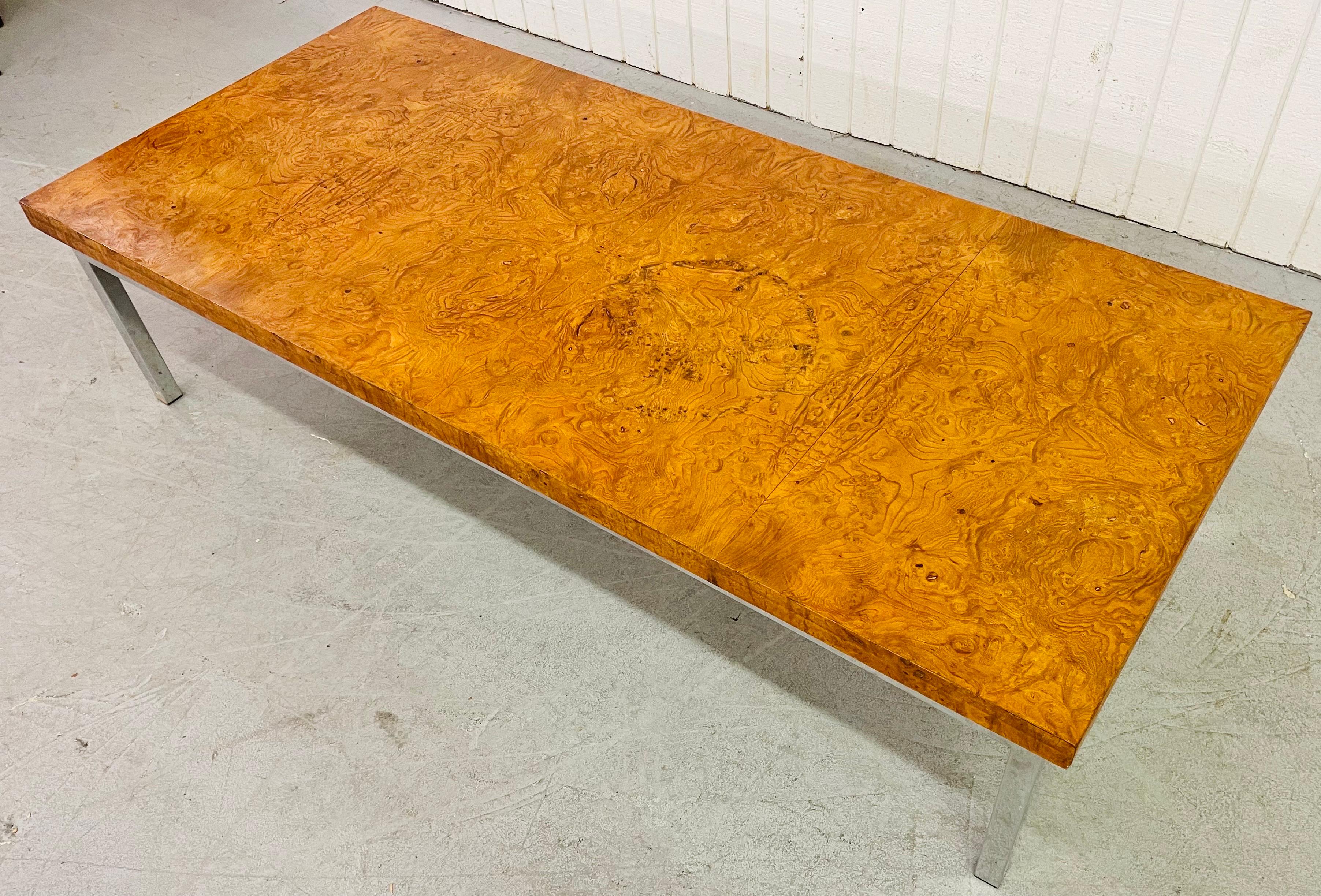 This listing is for a vintage Milo Baughman burled wood coffee table. Featuring a large rectangular burled wood top and an original flat bar chrome base.