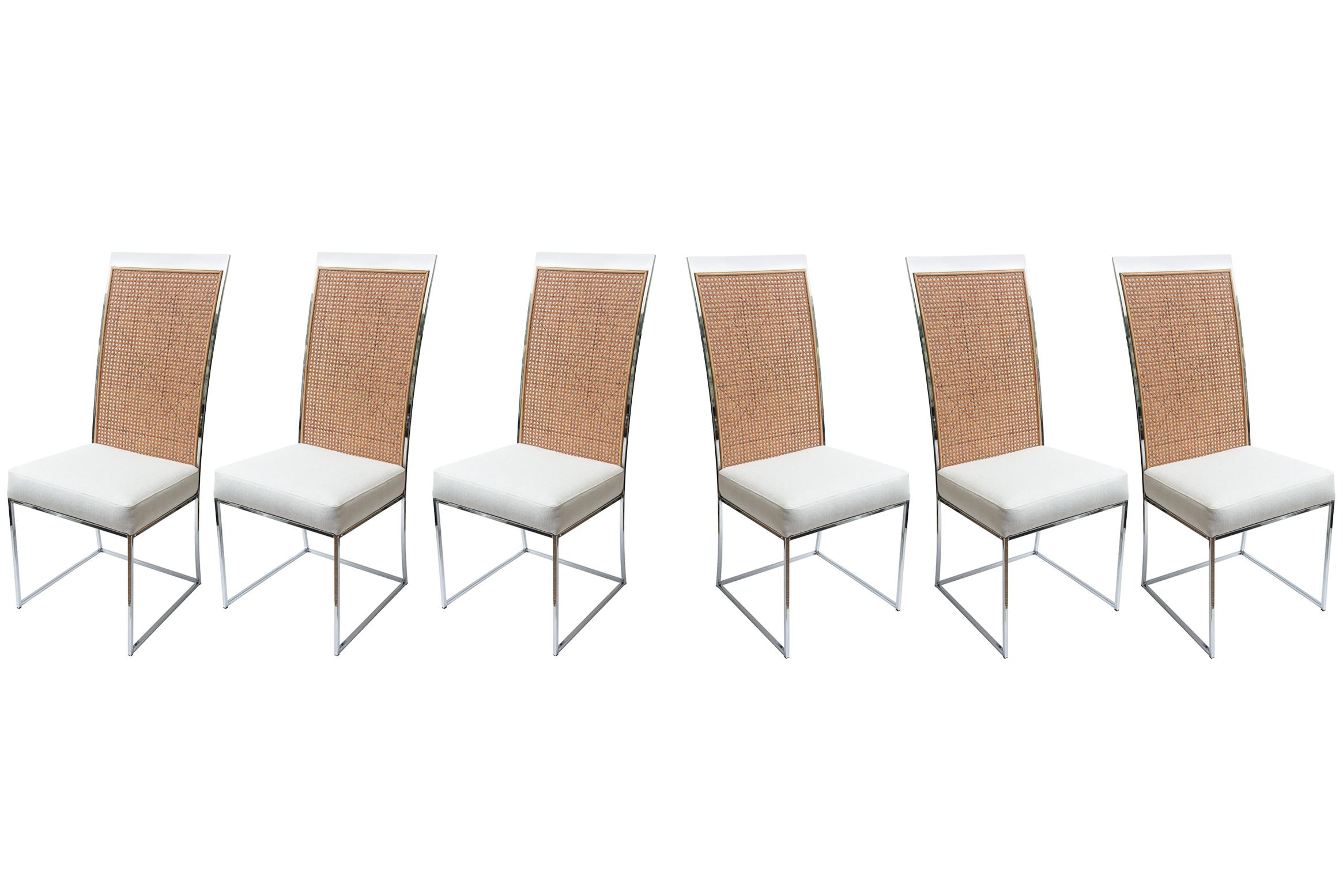 These iconic, vintage and fabulous set of 6 high back dining room chairs by Milo Baughman for Thayer Coggin are a combination of chrome and caned backs set of with upholstered seats. These are from the 70's. The seats have just been re-upholstered