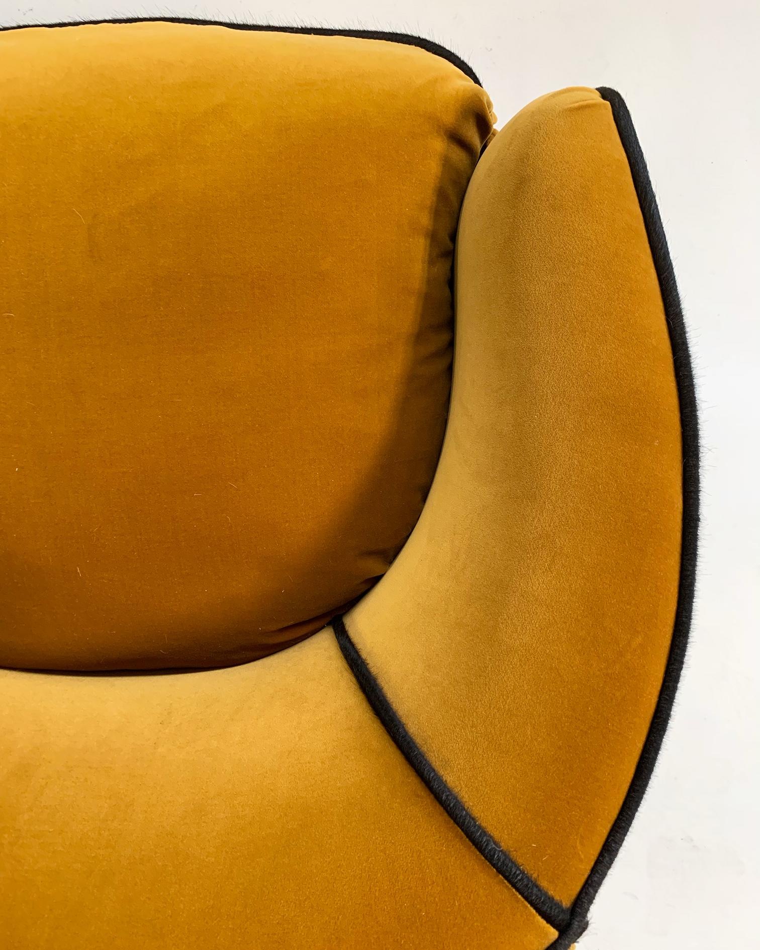 One of a Kind Vintage Lounge Chairs Restored in Loro Piana Velvet with Brazilian Cowhide Welting

These lounges are classic, simple, modern marvels. Our designers chose a ginger-hued Loro Piana velvet and welt of luxurious Brazilian black cowhide -