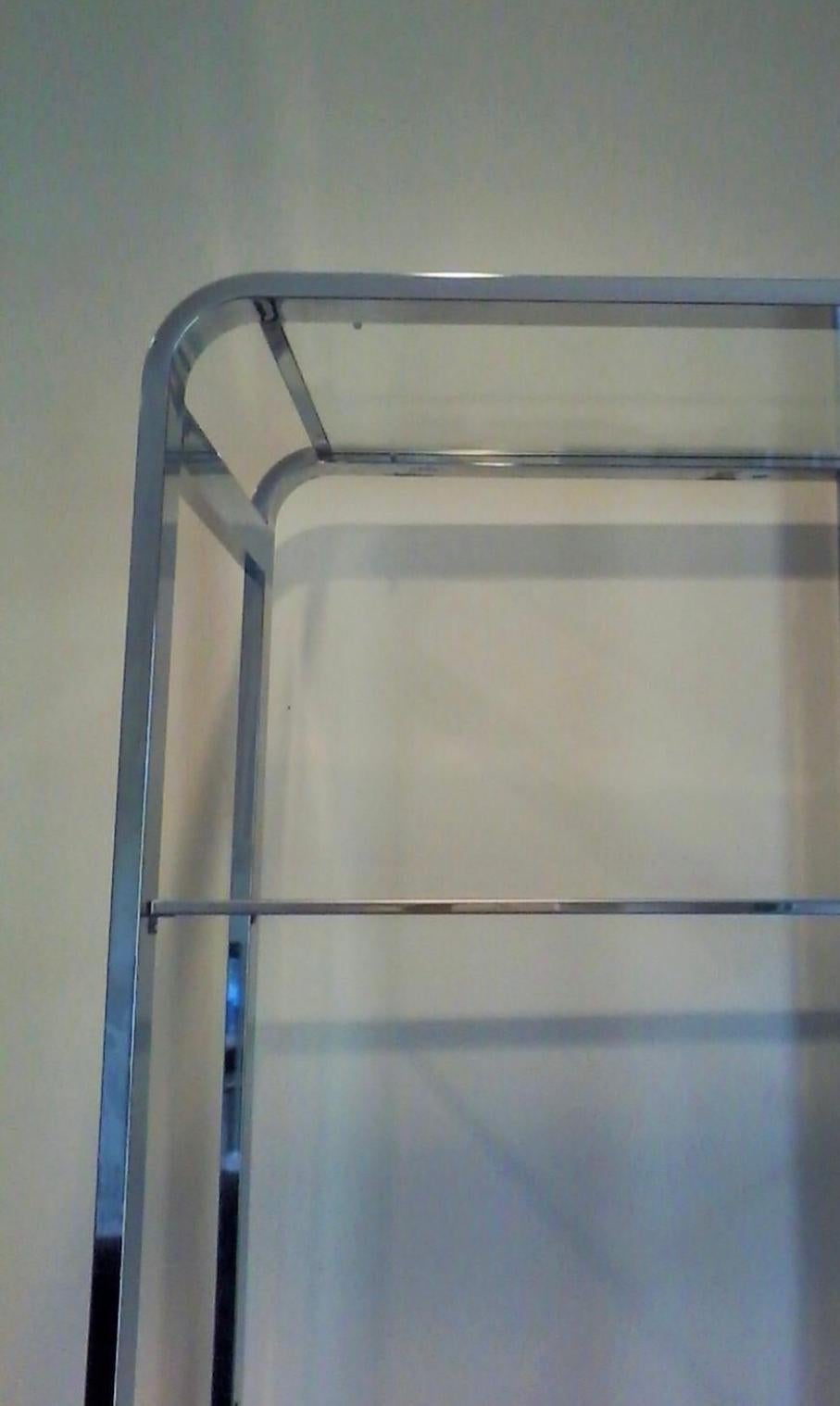 Fantastic chrome metal étagère by the uber-loved Baughman. Flat bar construction is sleek and minimalistic. All glass is present. Not flimsy or “tinny”, a substantial piece to own.
