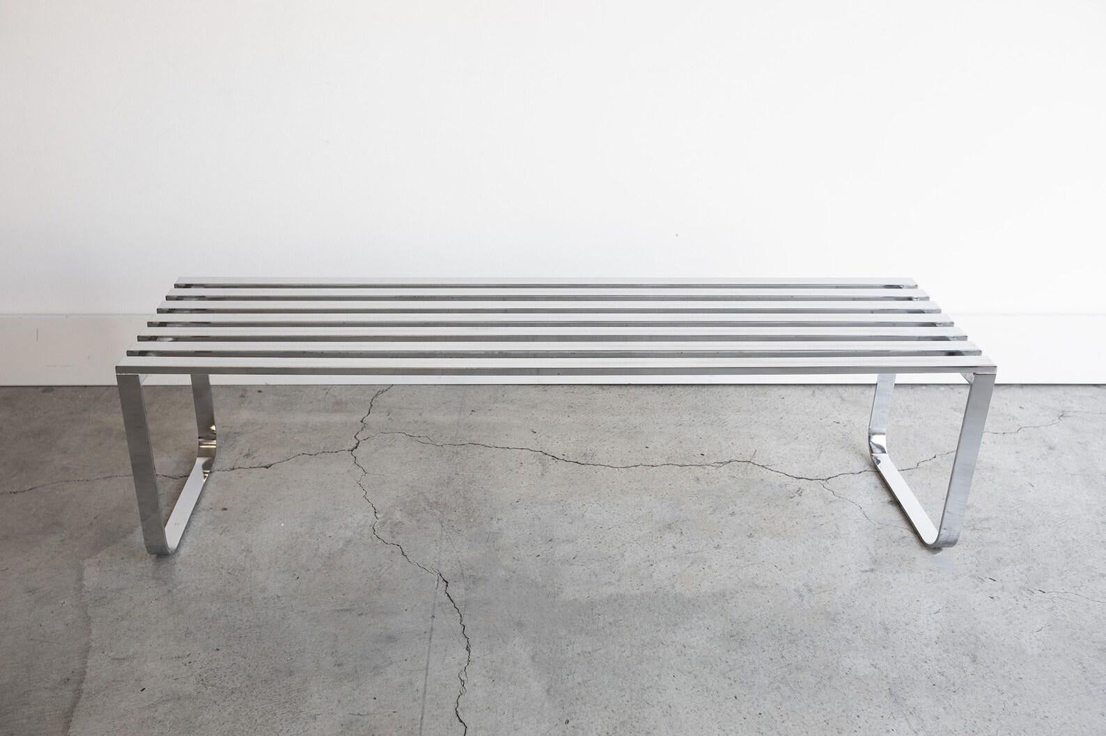 Gorgeous and very rare Milo Baughman chrome slatted bench from the 1970s for DIA (Design Institute of America). Can be used as a coffee table, bench in an entry way, or would sit beautifully at the foot of your bed. Perfect fit for any mid century