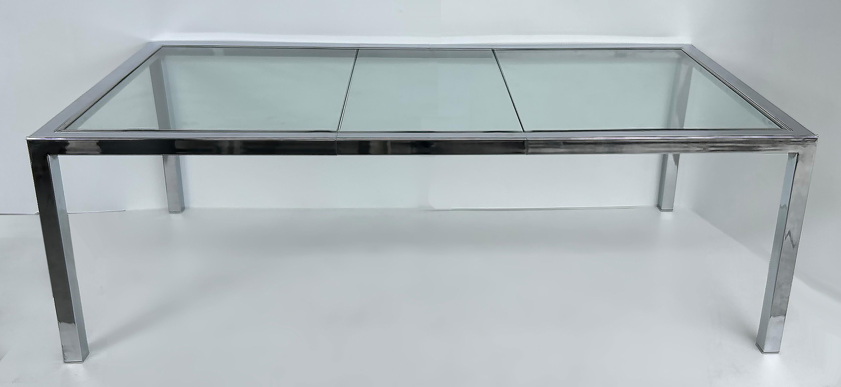 Vintage Milo Baughman DIA Chrome, Table de salle à manger en verre, extensible avec feuille

Nous proposons à la vente une table de salle à manger ou table de conférence extensible en verre et chrome de Milo Baughman pour Design Institute America,
