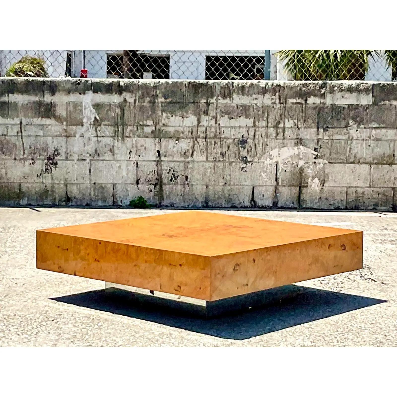 Spectacular vintage Milo Baughman for Thayer Coggin coffee table. Gorgeous Burl wood top that rests on a chrome plinth. Makers tag on the bottom. A real beauty. Incredible wood grain detail. Acquired from a New Orleans estate.