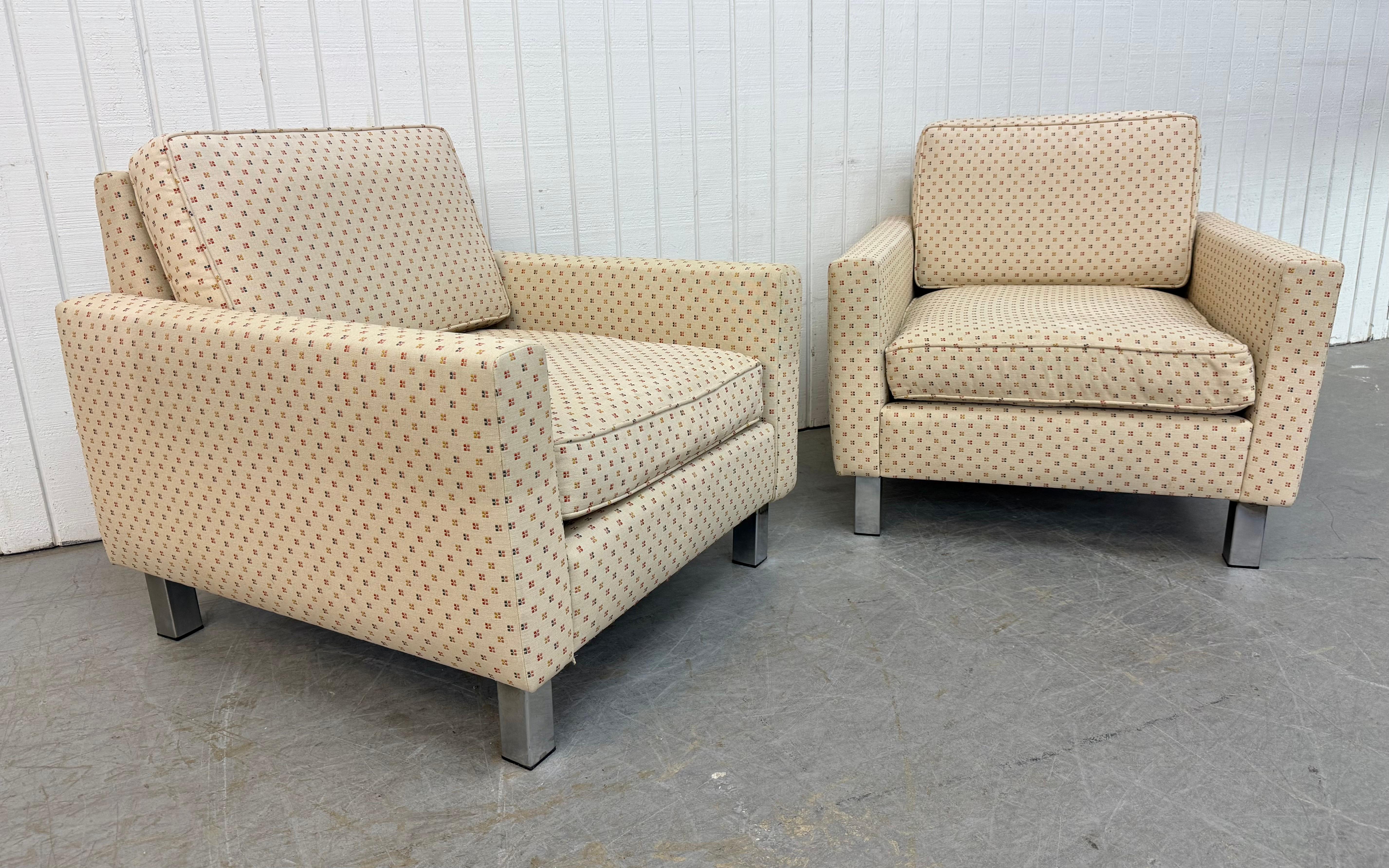 This listing is for a pair of Vintage Milo Baughman Style Club Chairs. Featuring a straight line design, elongated sides, removable seat/back cushion, chrome modern legs, and original upholstery. This is an exceptional combination of quality and