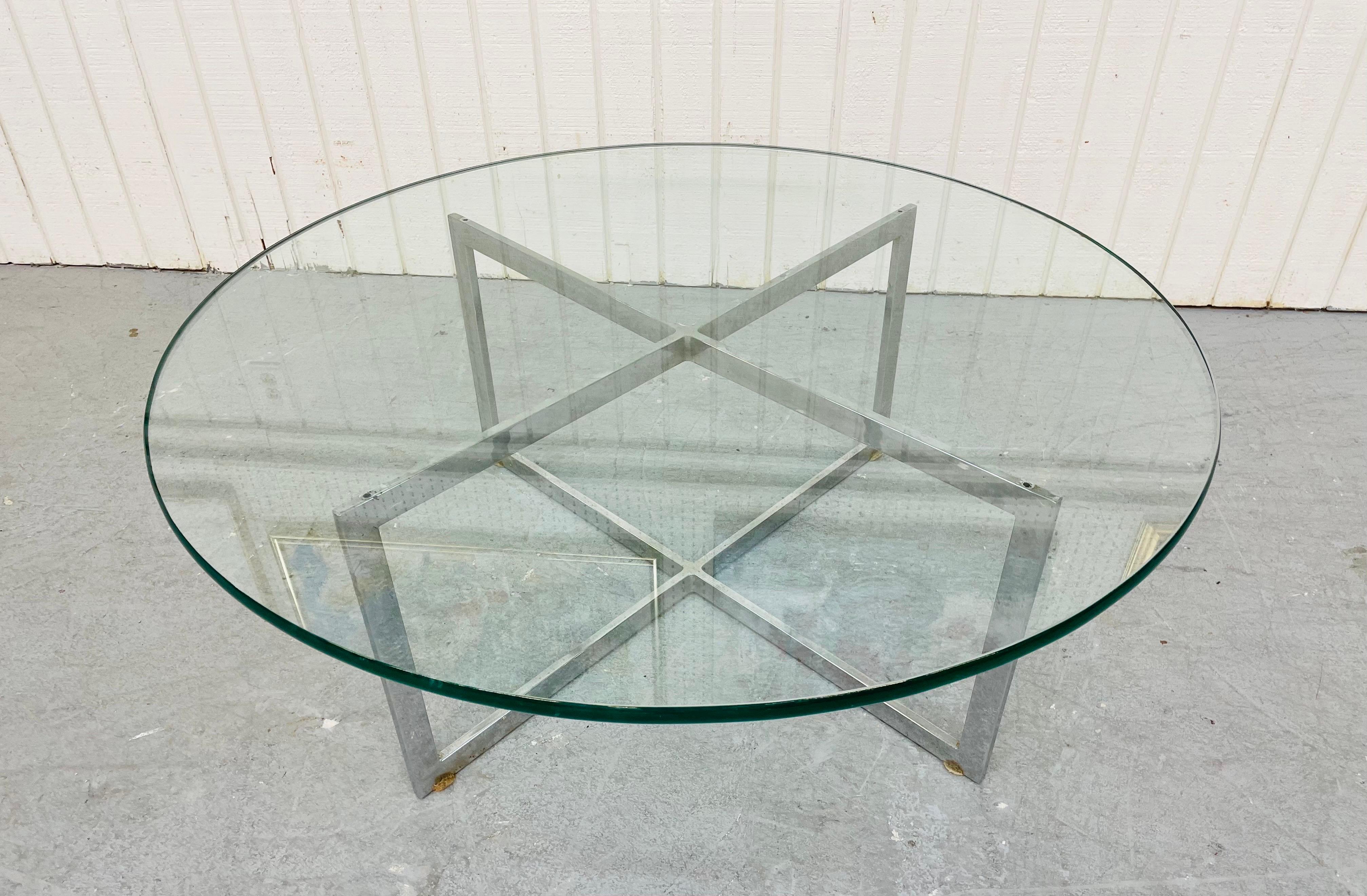 This listing is for a vintage Milo Baughman Style Flat Bar Chrome Glass Top Coffee Table. Featuring a thick round glass top and a crisscross flat bar chrome base.