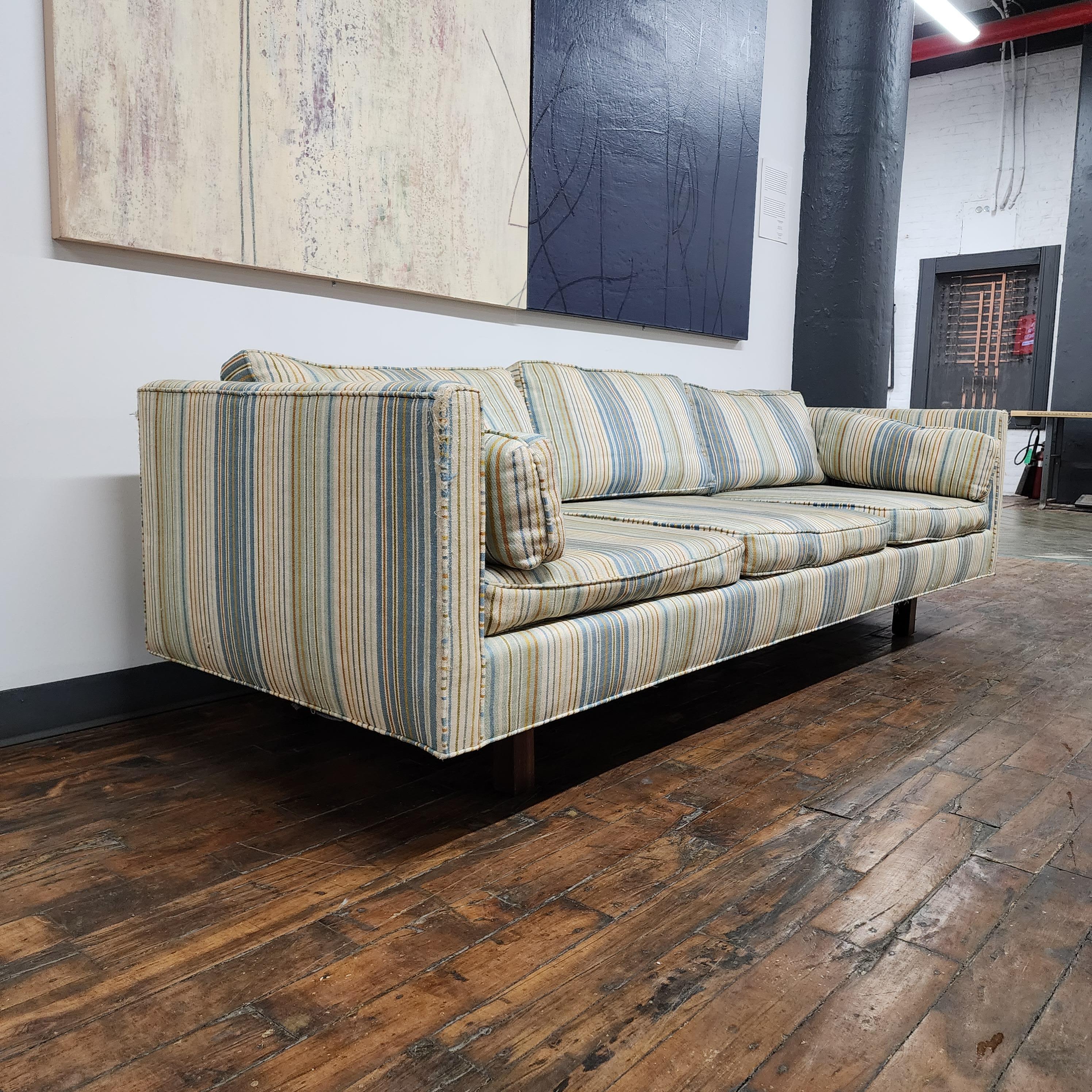 wonderful vintage Milo Baughman style sofa by Martin Industries of Philadelphia Pennsylvania.   this sofa features the original Striped upholstery and walnut legs.