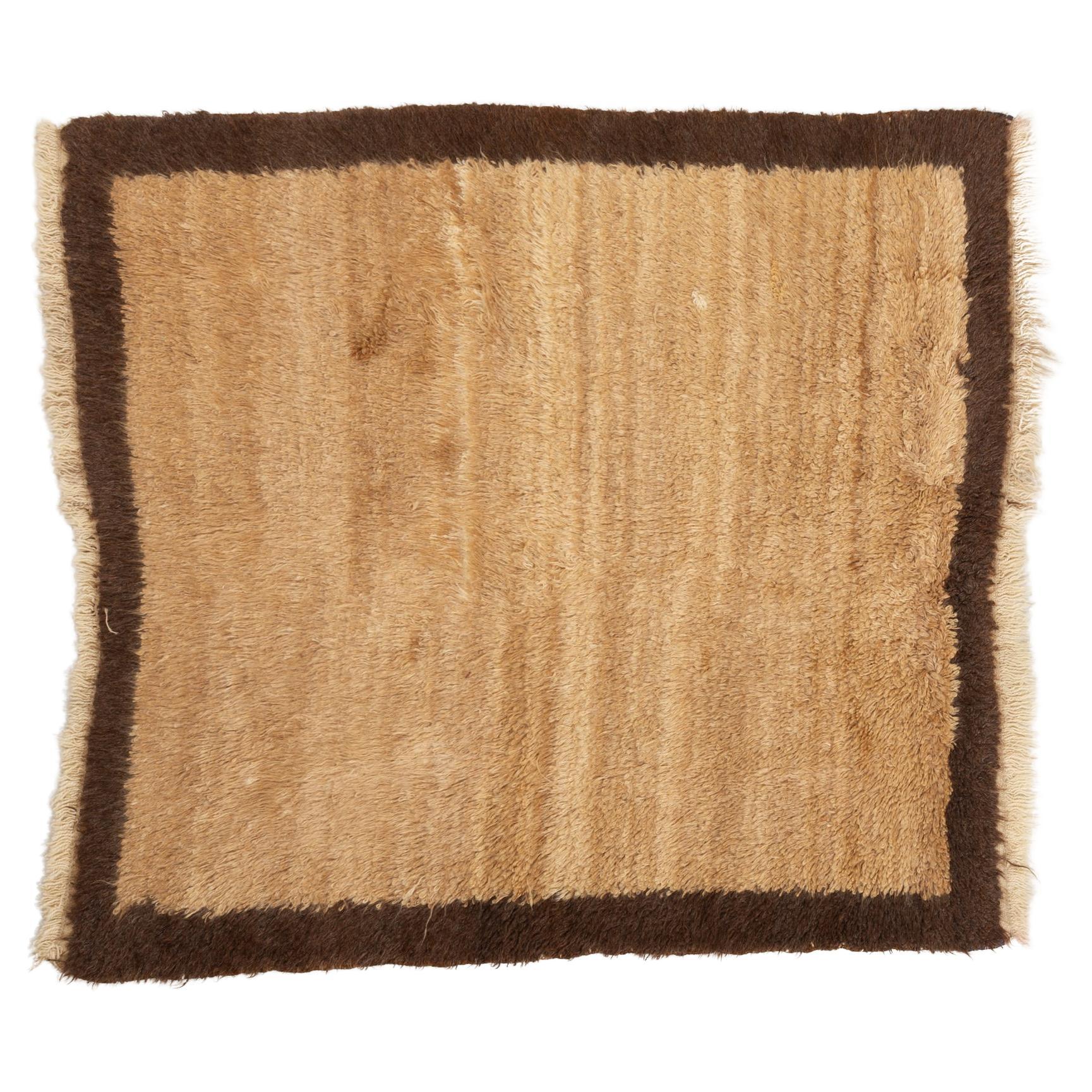 Minimalistischer Vintage-Teppich TULU, auch für Sessel