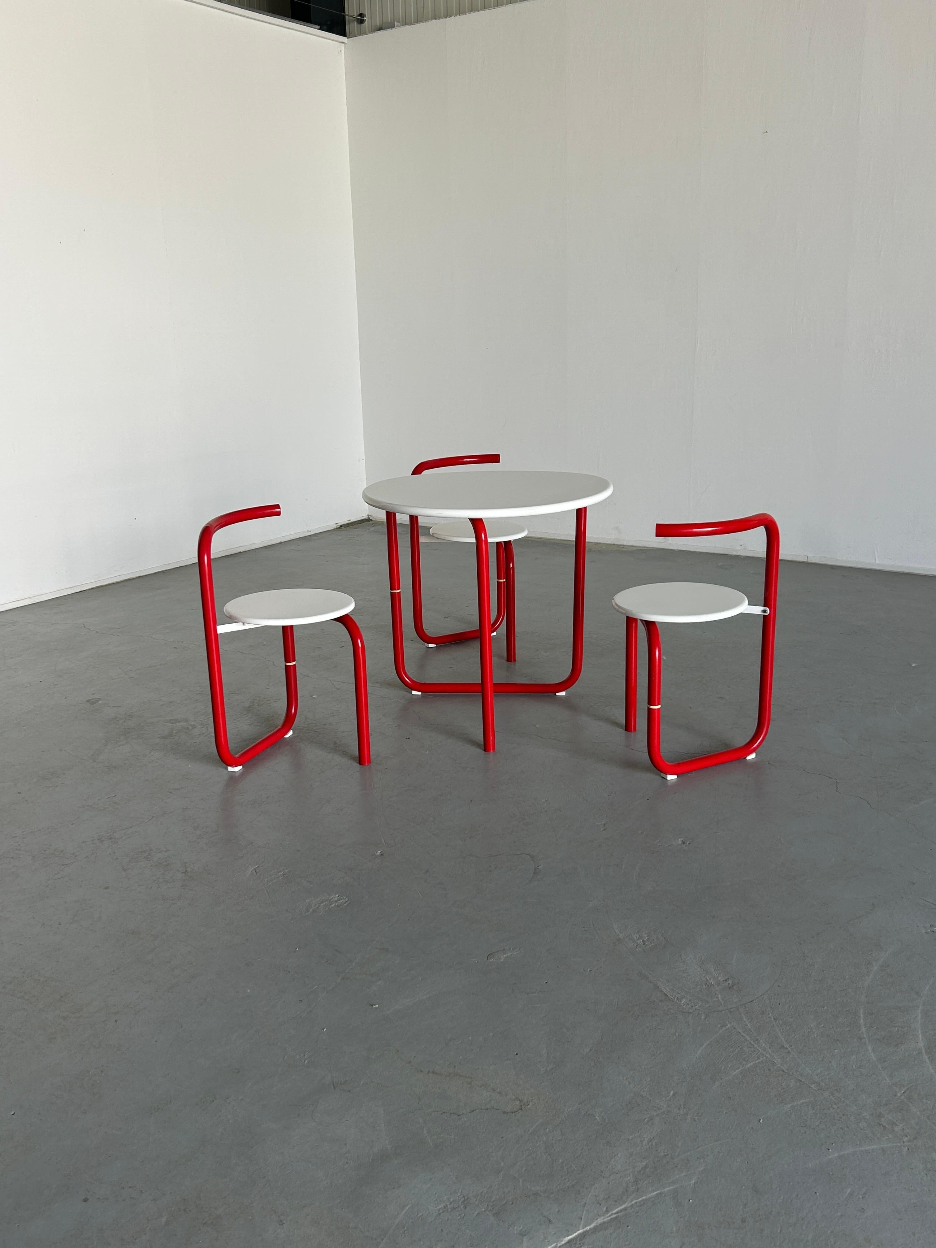 Set of three minimalist pop-art garden chairs with a matching garden table.
Unique design, 1970s Yugoslavian production.
Foldable.

Overall in very good vintage condition with smaller signs expected signs of age.
Condition is well depicted in the