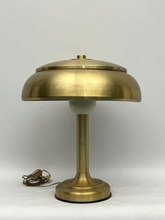 Vintage Ministerial gilded table lamp. Italy 1950s