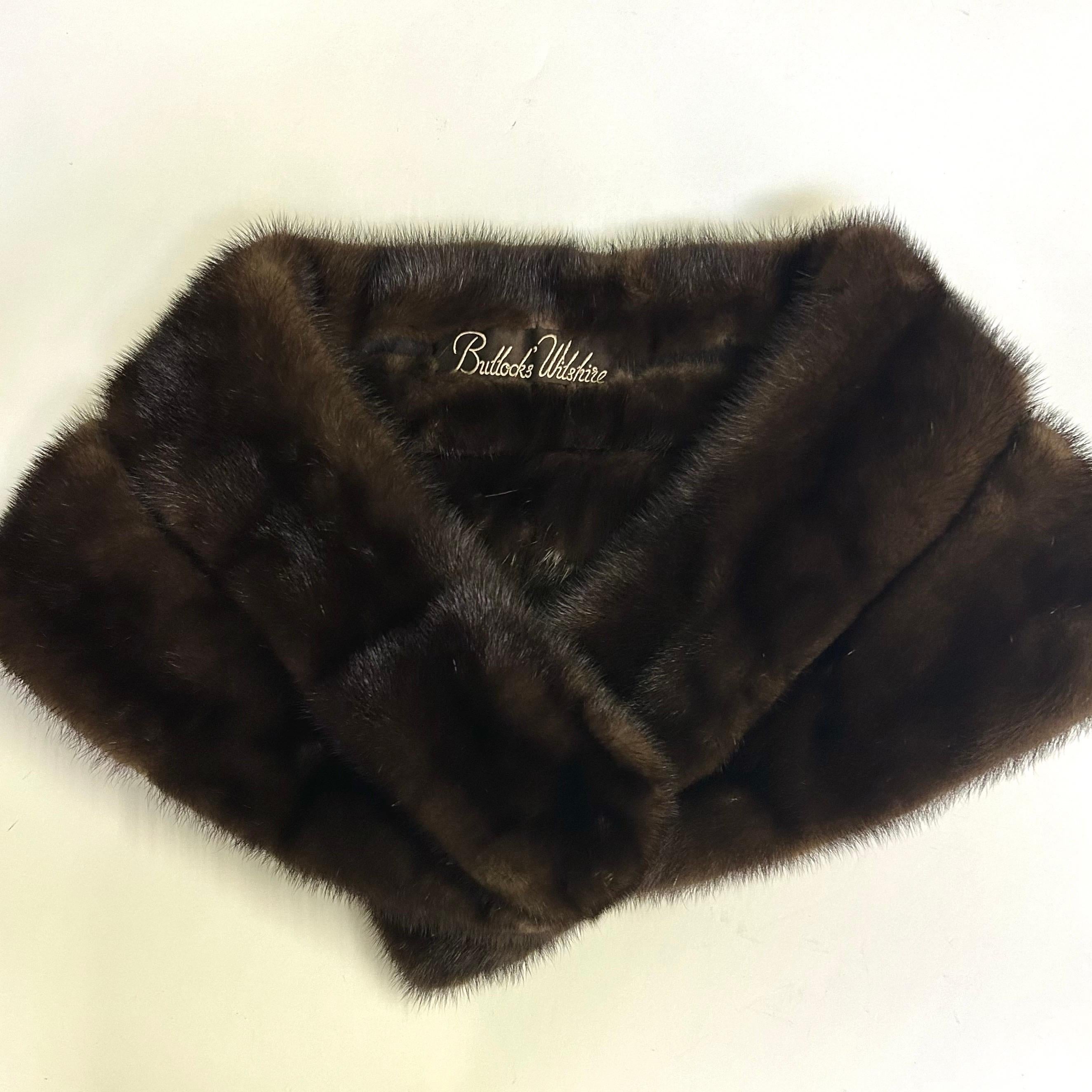 Stunning dark brown mink fur wrap, stole, collar, cape, scarf or fling by Bullock's Wilshire. Fully lined (in velvet) with front hook closure. The width measures 8