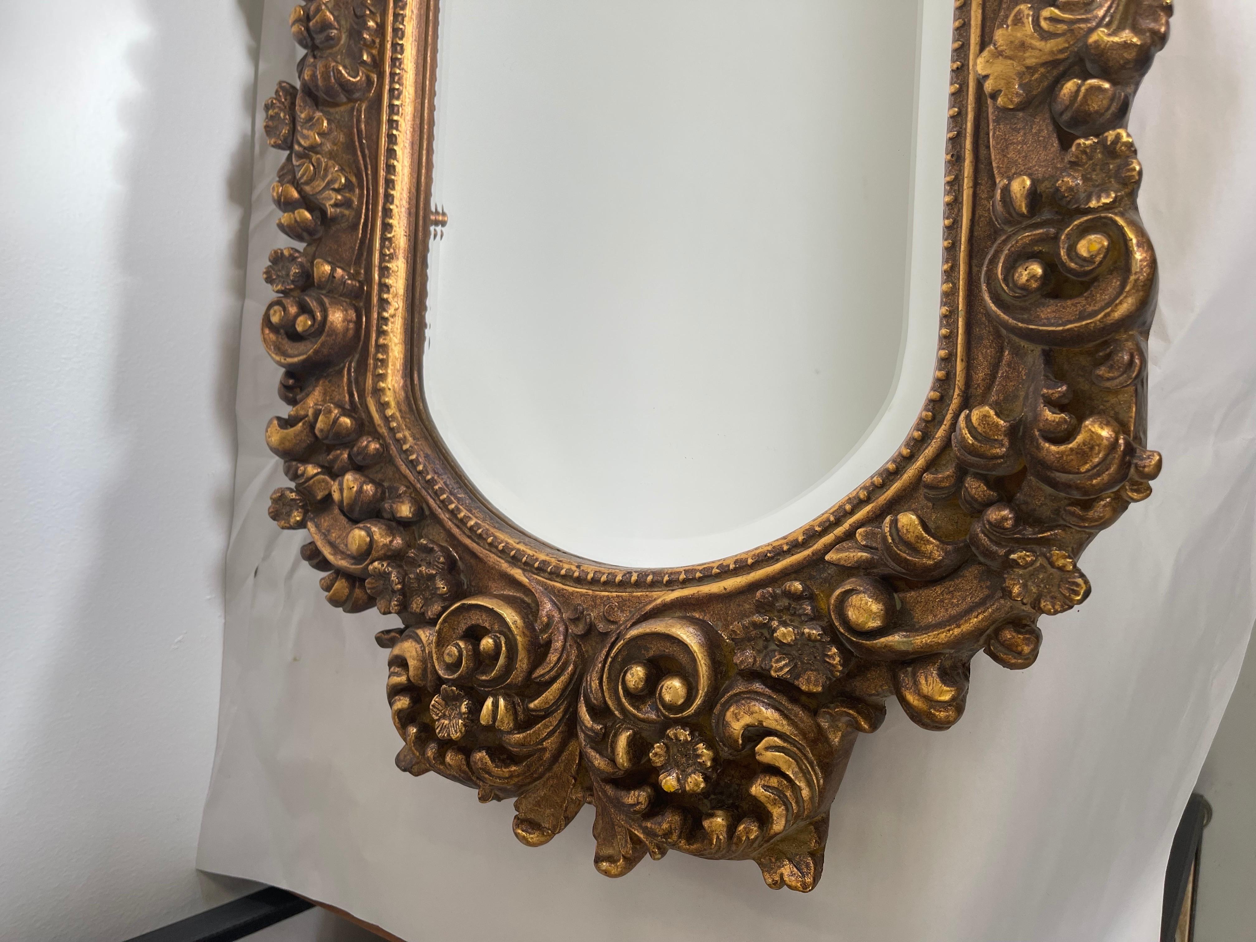 Vintage mirror 

Dimensions 18 W ; 23 1/2 H ; 2 D.