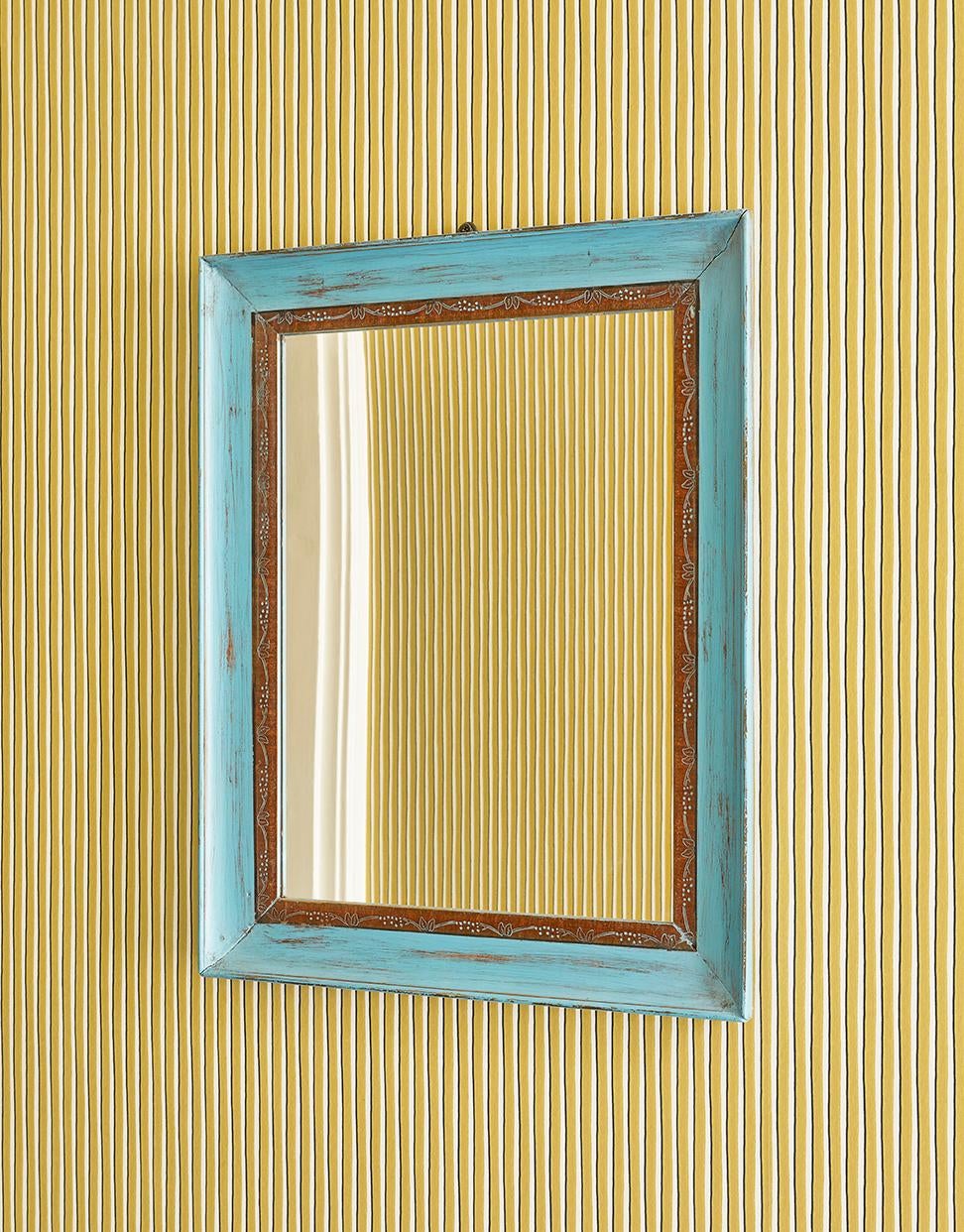 Italy, early 20th century

Mirror in blue painted wooden frame.

Measures: H 64 x W 52 x D 3.5 cm.