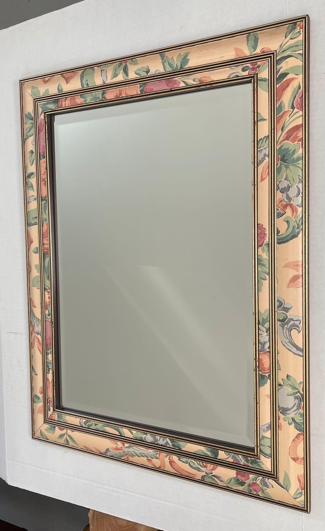 Vintage Beveled Mirror Framed with Gold Accents and Floral Print.Makers Mark on the Back States Canadian. Vintage Condition Consistent with Age as Pictured.

Dimensions. 21 W ; 3/4 D ; 27 H