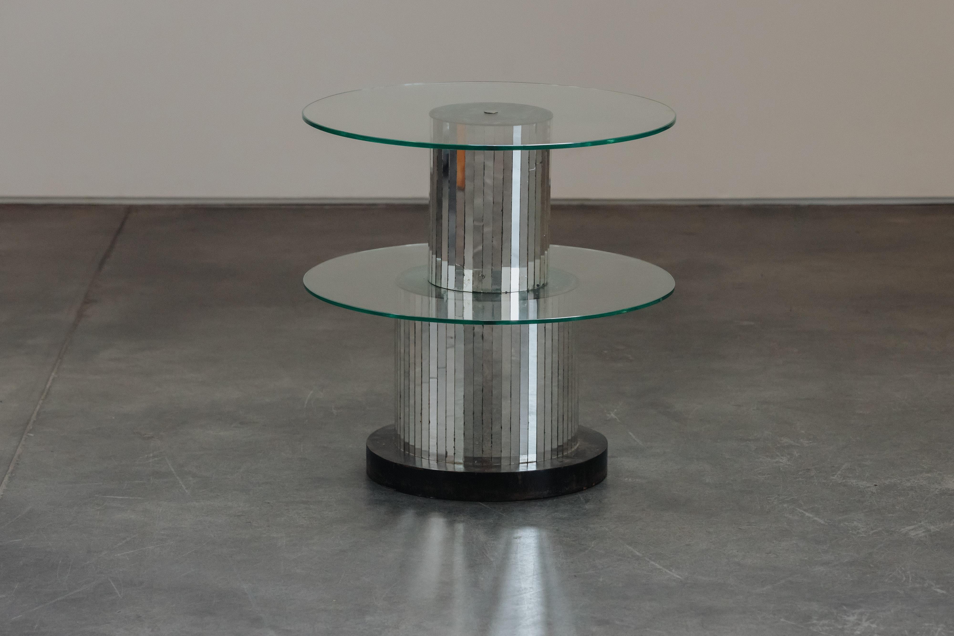 Vintage Mirrored Side Table From Italy, Circa 1970s.  Unusual model with two tiered original glass shelves and inlaid mirror on the base.  