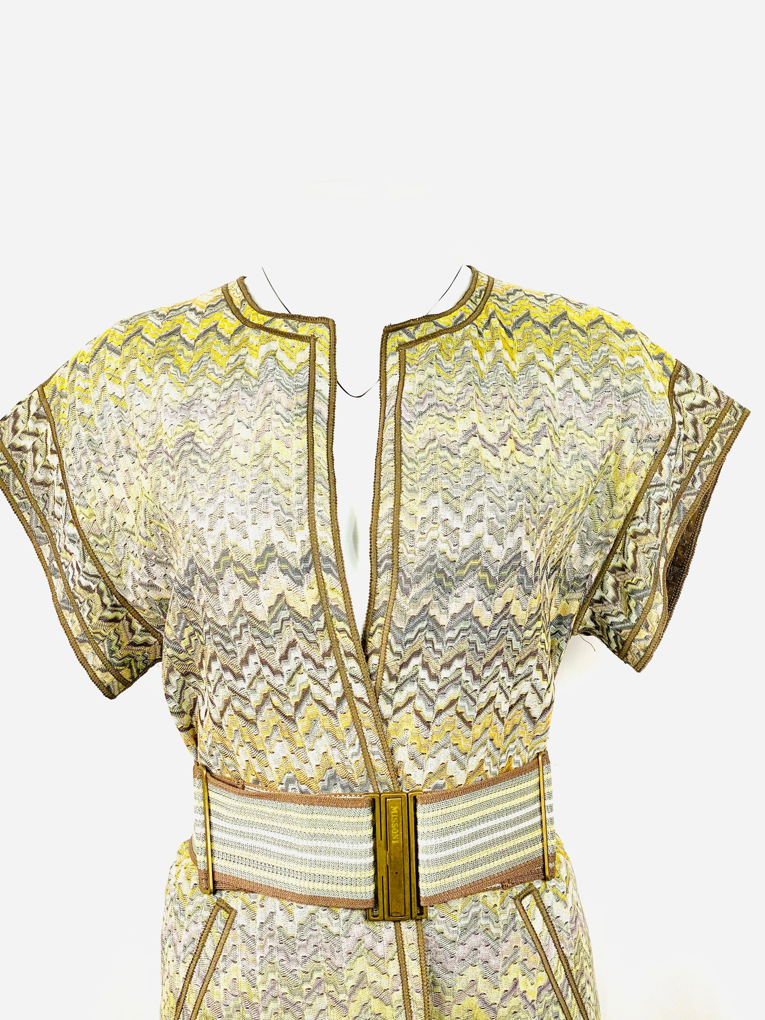 Vintage Missoni Multi Color Coat Cover Up Mini Dress w/ Belt Size 42

Product details:
Size 42
Brown/ beige and yellow with zig zag pattern 
Short sleeves 
Mini length 
Featuring adjustable belt closure detail
Slit detail on each side, measures 16