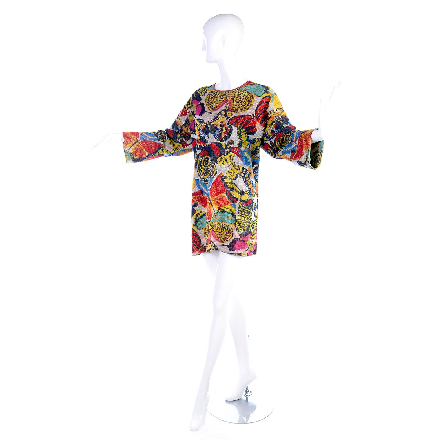 This wonderful vintage Missoni sweater is in a linen, rayon, cotton and nylon blend knit fabric in a multi color butterfly print.  You can wear this as an oversized sweater or mini dress, depending on your height. and it is labeled Missoni For Saks