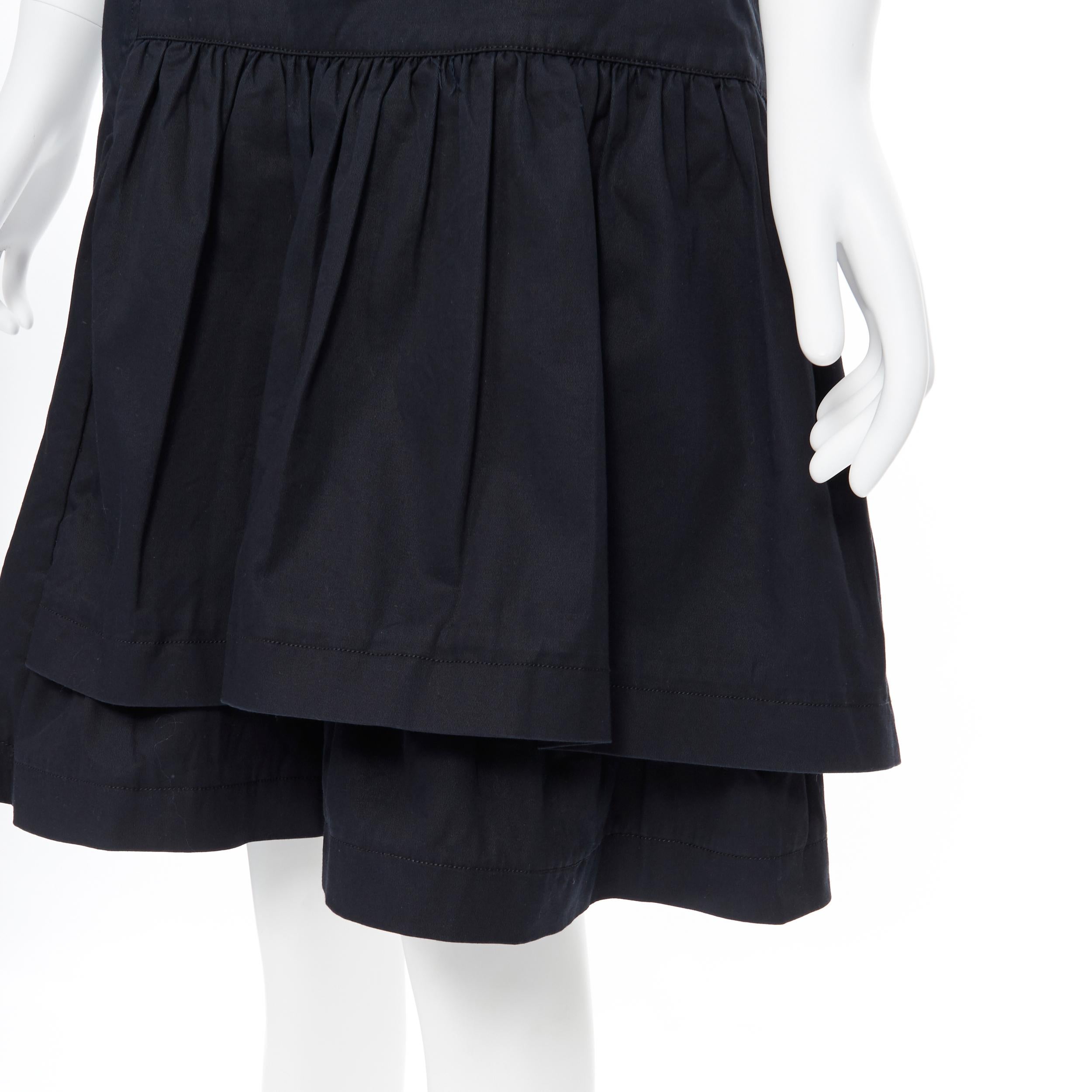 vintage MIU MIU black cotton pleated tiered flared knee skirt IT40
Brand: Miu Miu
Designer: Miuccia Prada
Collection: 2008
Model Name / Style: Flare skirt
Material: Cotton blend
Color: Black
Pattern: Solid
Closure: Zip
Extra Detail: Pleated off
