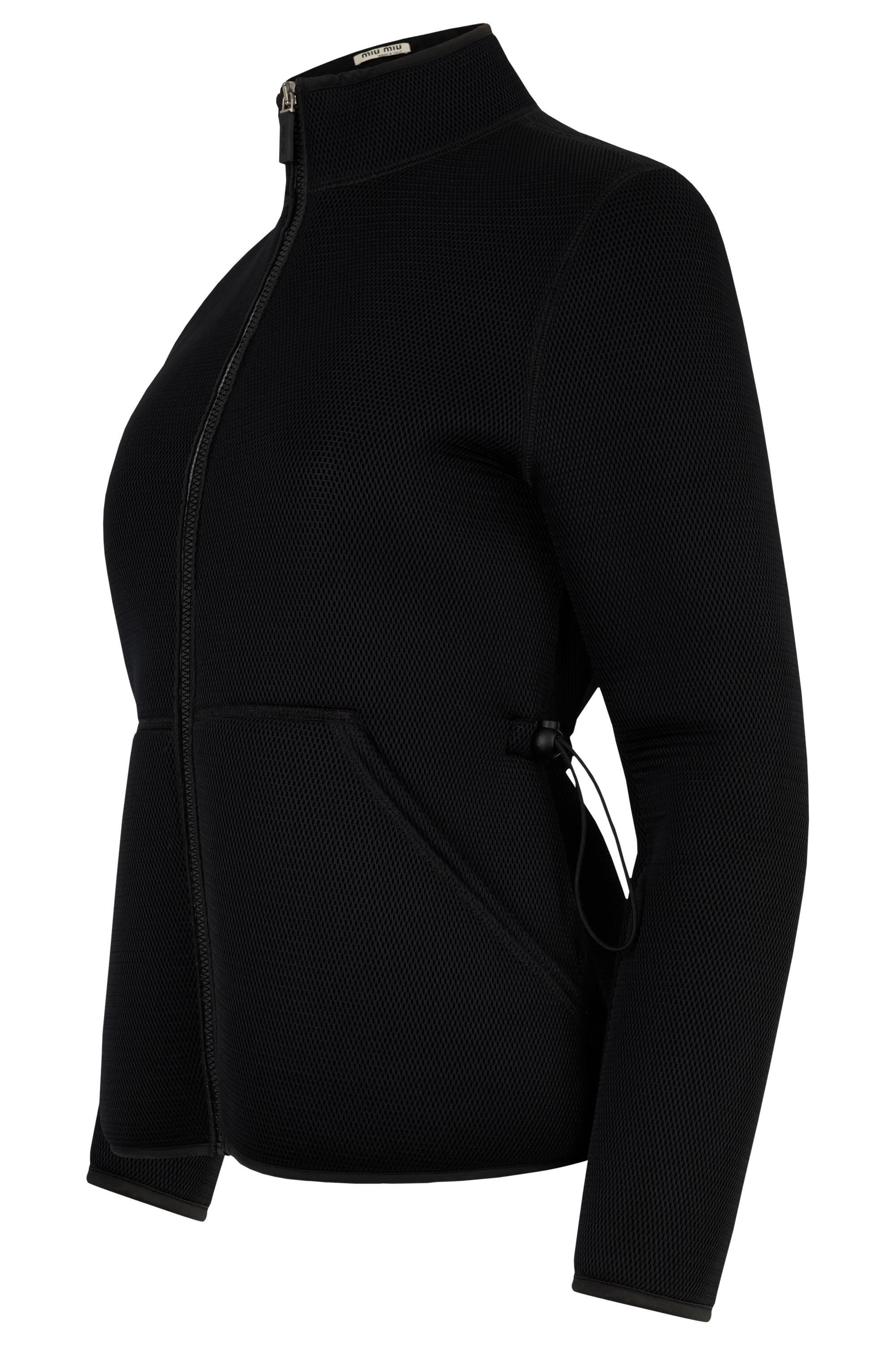 Vintage Miu Miu F/W 1999 black neoprene jacket., Features a black technical neoprene fabric ,sculpted and futuristic silhouette, high neck and adjustable side ties to cinch the waist. Two side pockets, polyester lining and Fastens with a front zip